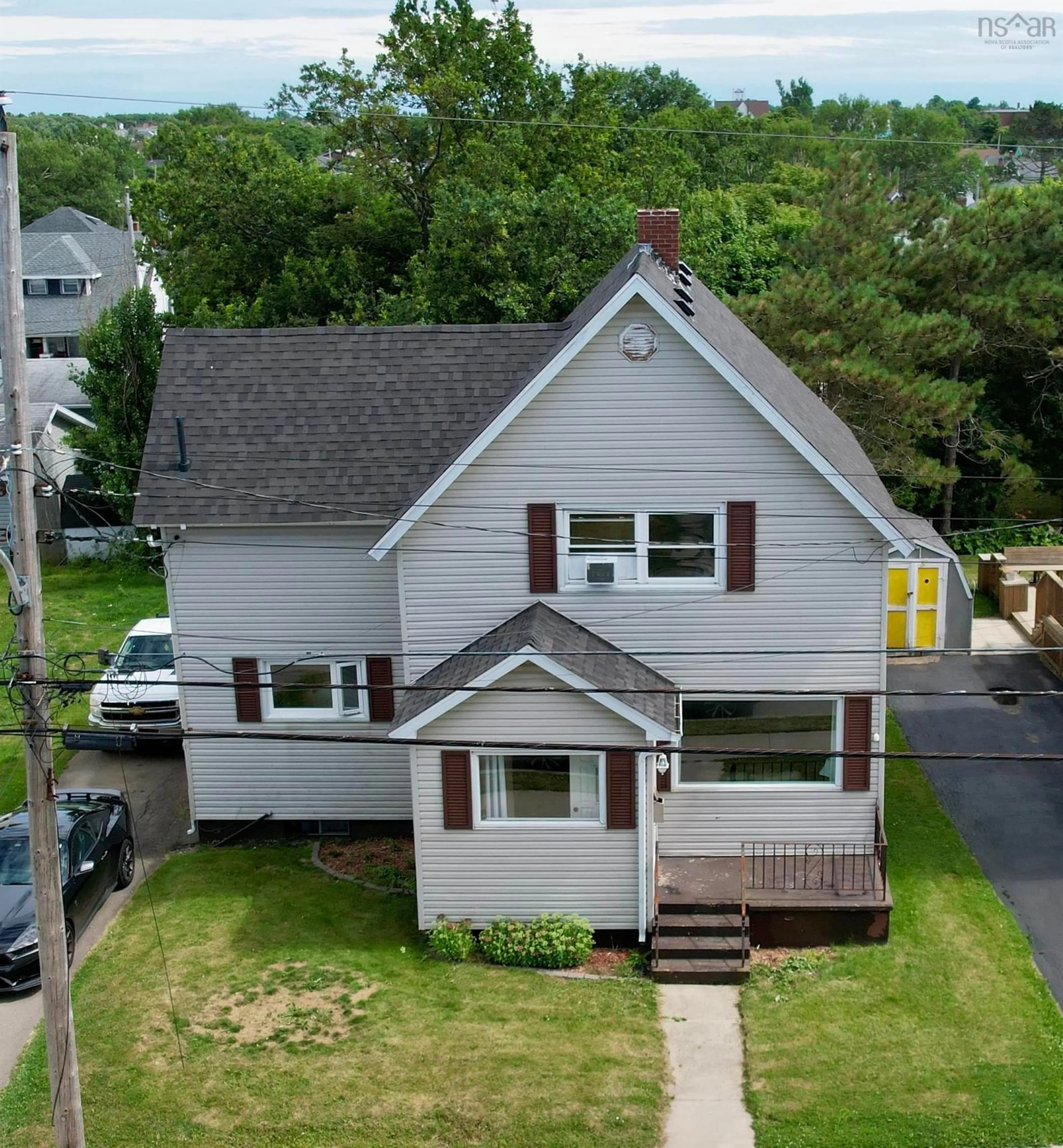 A pic from outside/outdoor area/front of a property/back of a property/a pic from drone, street for 319 York St, Glace Bay Nova Scotia B1A 2M6