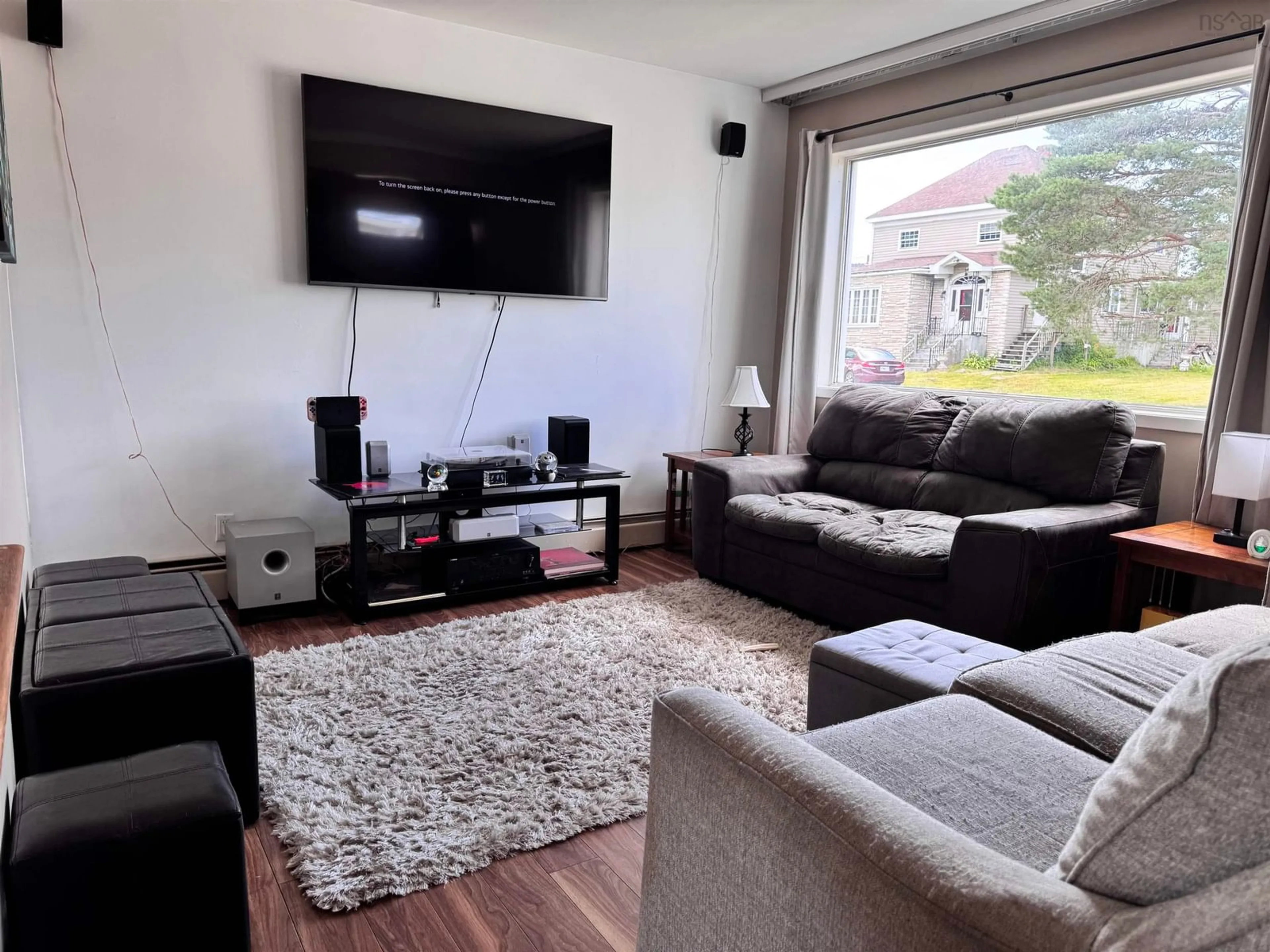 Living room with furniture, unknown for 319 York St, Glace Bay Nova Scotia B1A 2M6