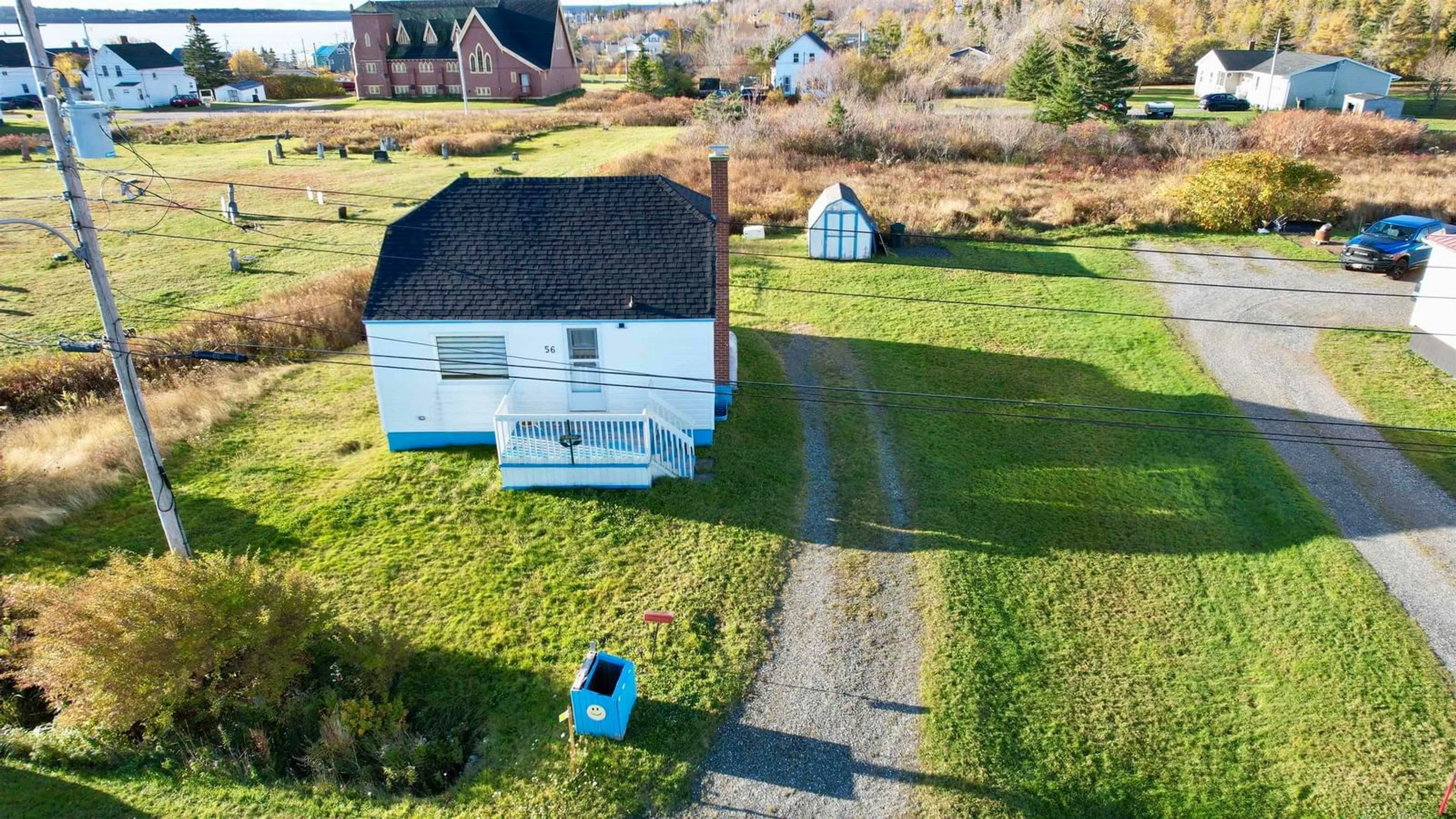 A pic from outside/outdoor area/front of a property/back of a property/a pic from drone, unknown for 56 Birch St, Port Morien Nova Scotia B1A 2M6