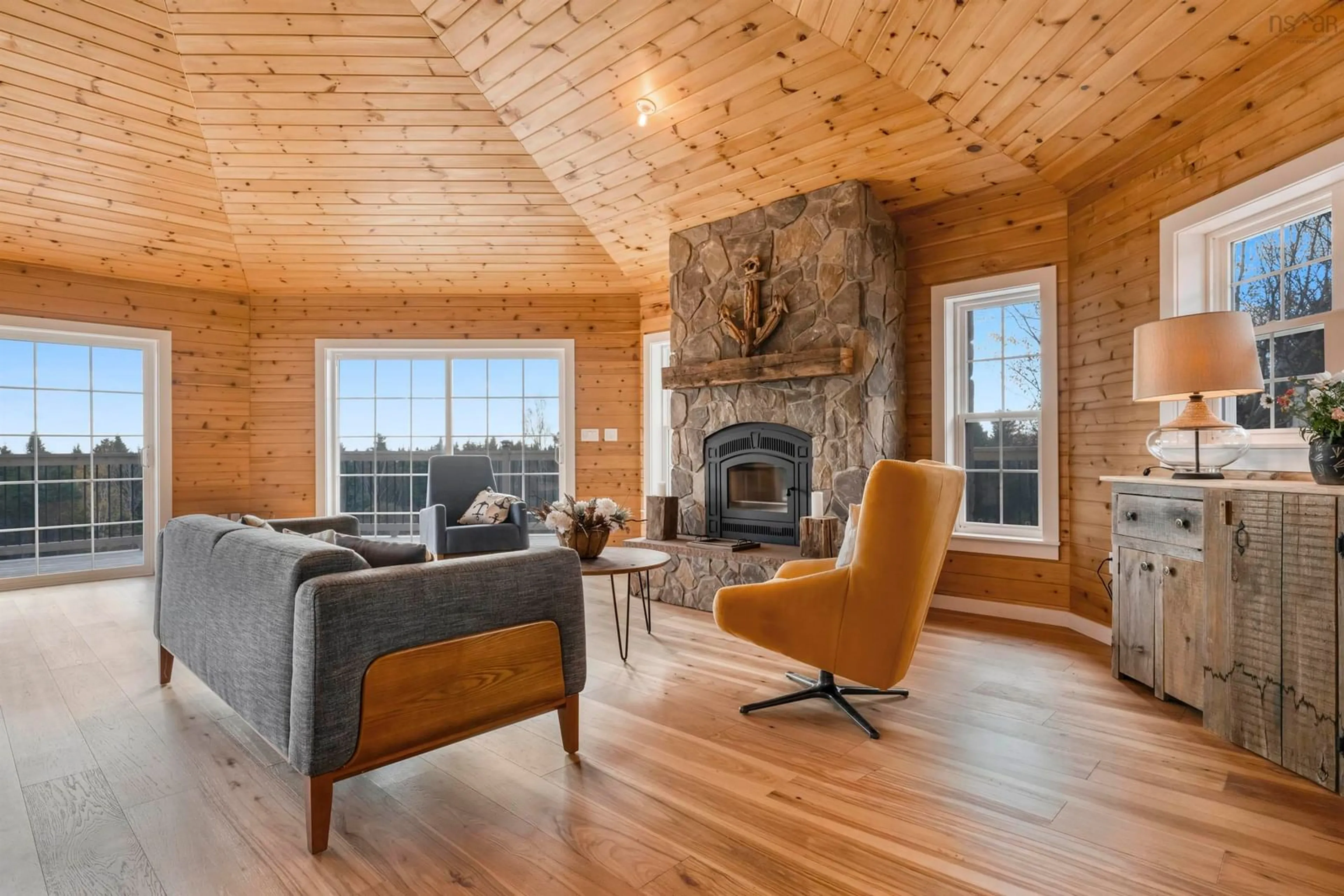 Living room with furniture, wood/laminate floor for 93 Rye Hill Rd, Garden Lots Nova Scotia B0J 2C0