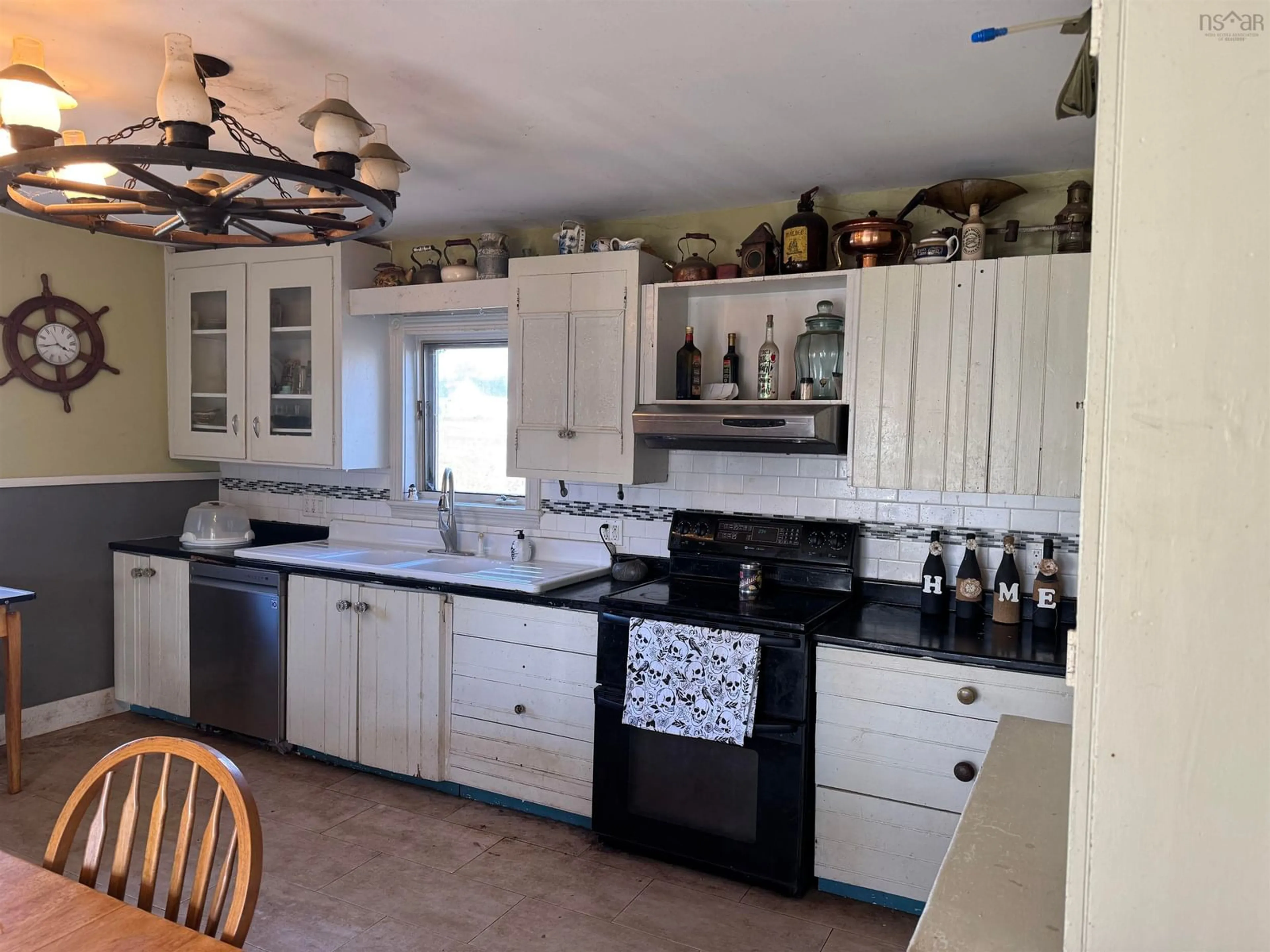 Open concept kitchen, ceramic/tile floor for 1776 Forties Rd, Forties Nova Scotia B0J 2M0