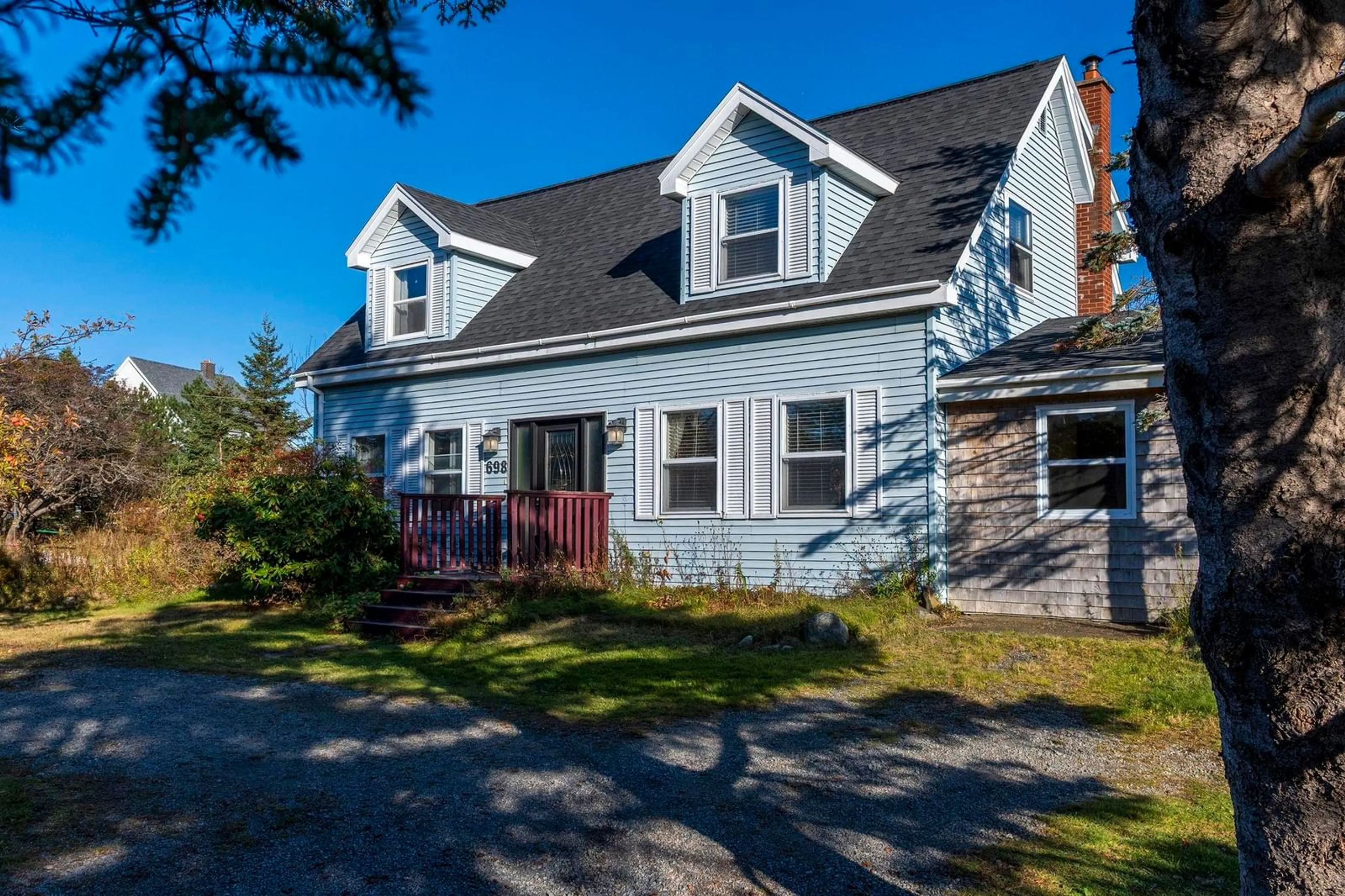 Home with vinyl exterior material, street for 698 Ketch Harbour Rd, Portuguese Cove Nova Scotia B3V 1K2