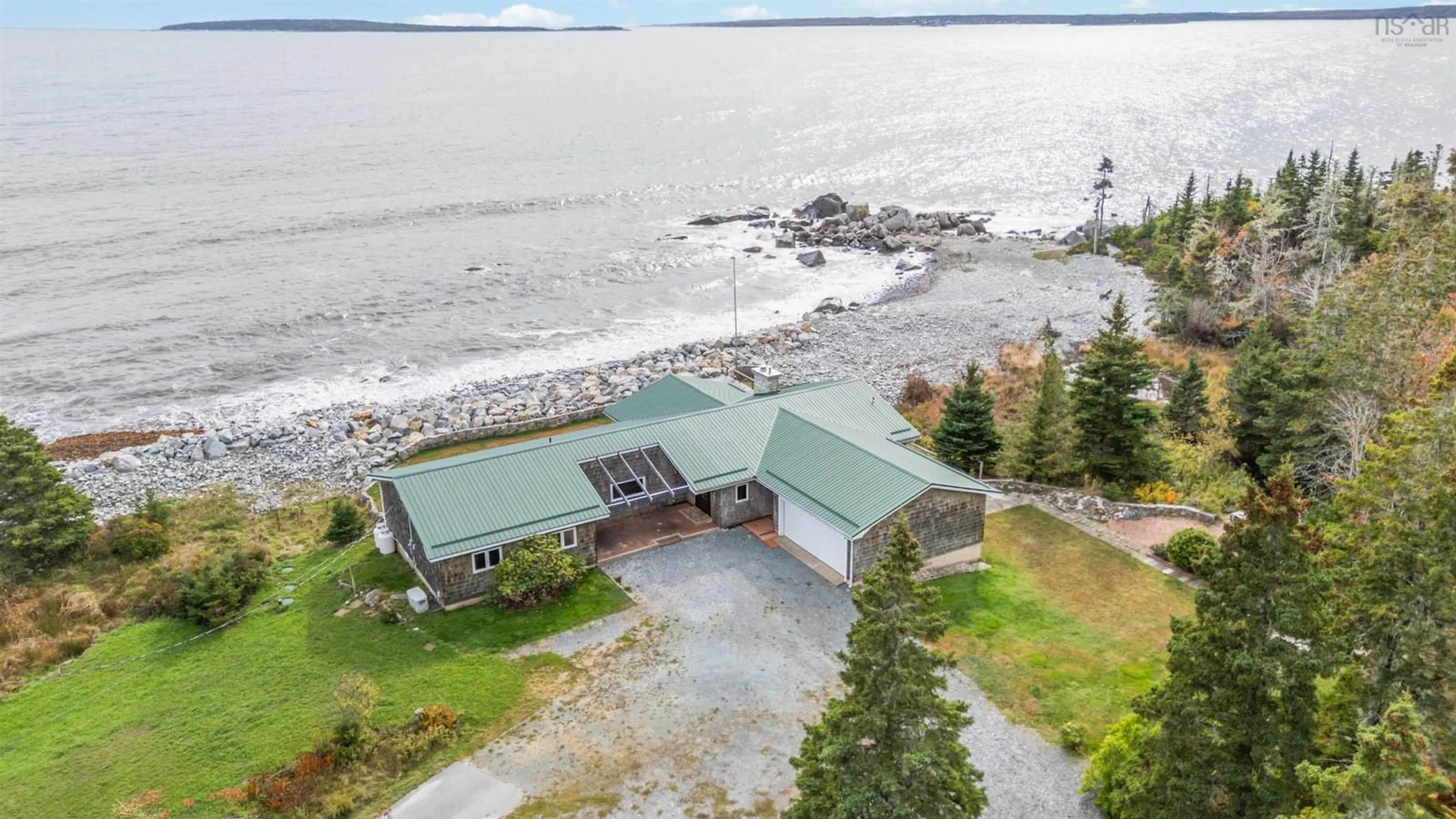 A pic from outside/outdoor area/front of a property/back of a property/a pic from drone, water/lake/river/ocean view for 6969 Highway 3, Hunts Point Nova Scotia B0T 1G0