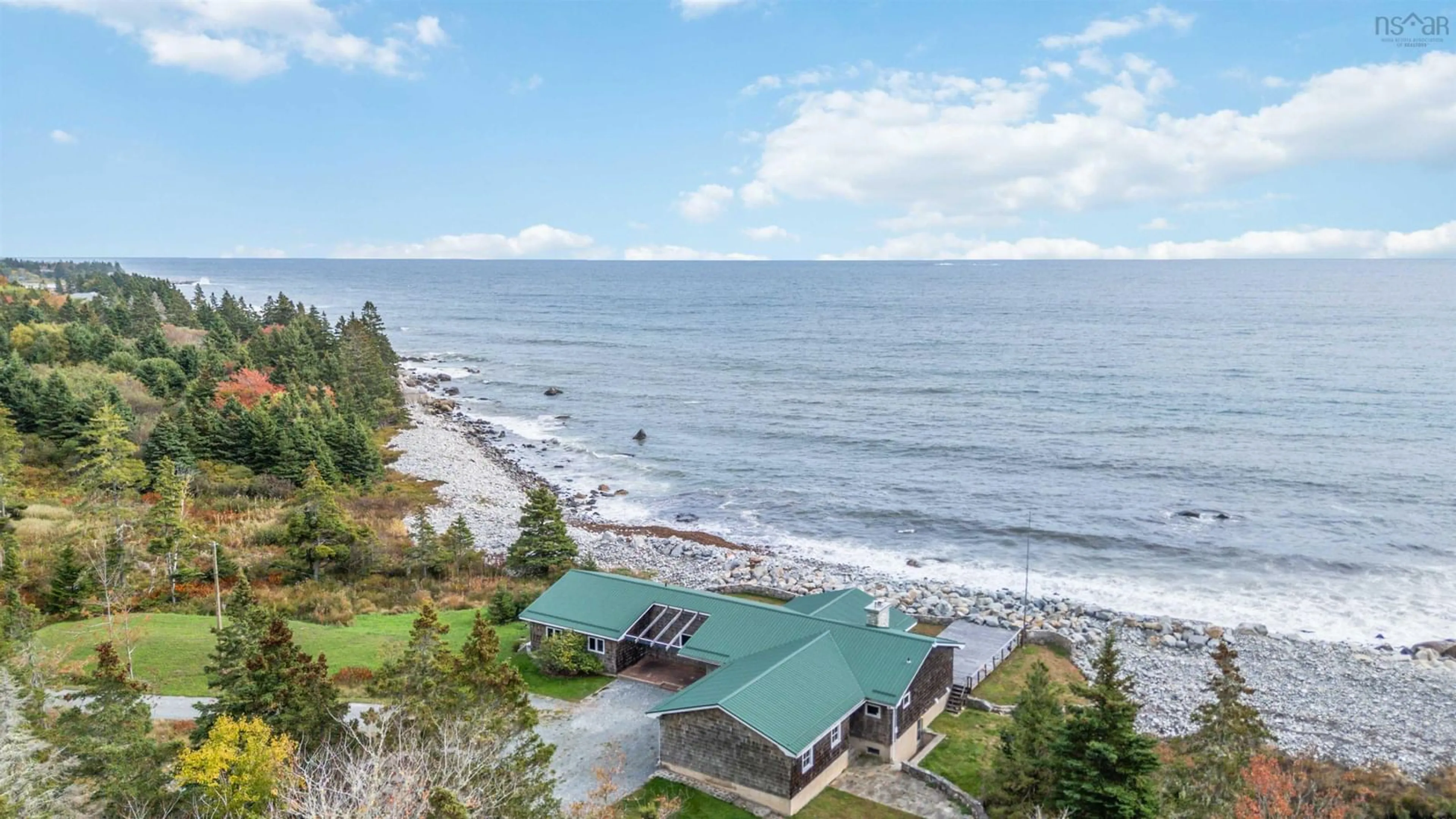 A pic from outside/outdoor area/front of a property/back of a property/a pic from drone, water/lake/river/ocean view for 6969 Highway 3, Hunts Point Nova Scotia B0T 1G0