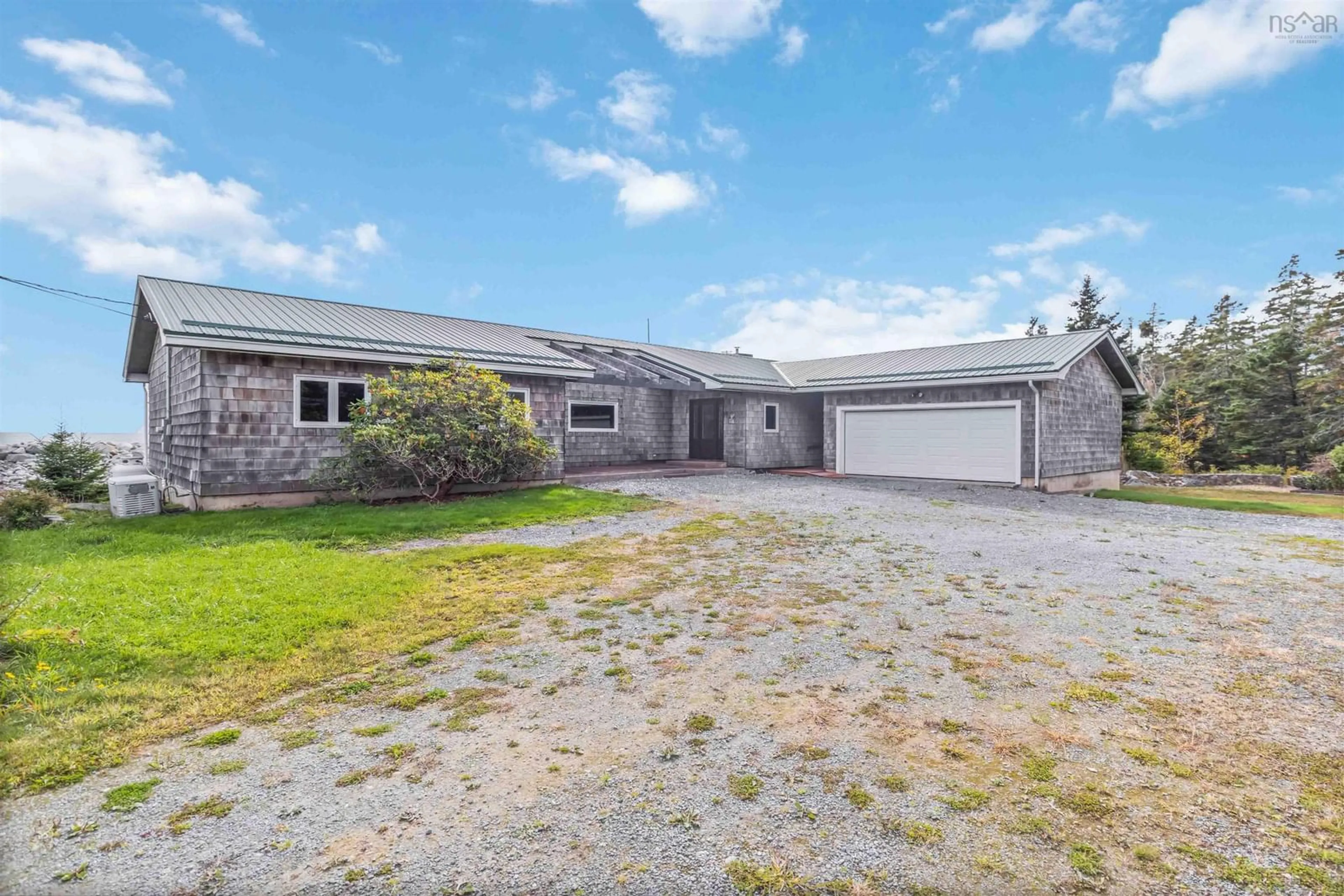 A pic from outside/outdoor area/front of a property/back of a property/a pic from drone, street for 6969 Highway 3, Hunts Point Nova Scotia B0T 1G0