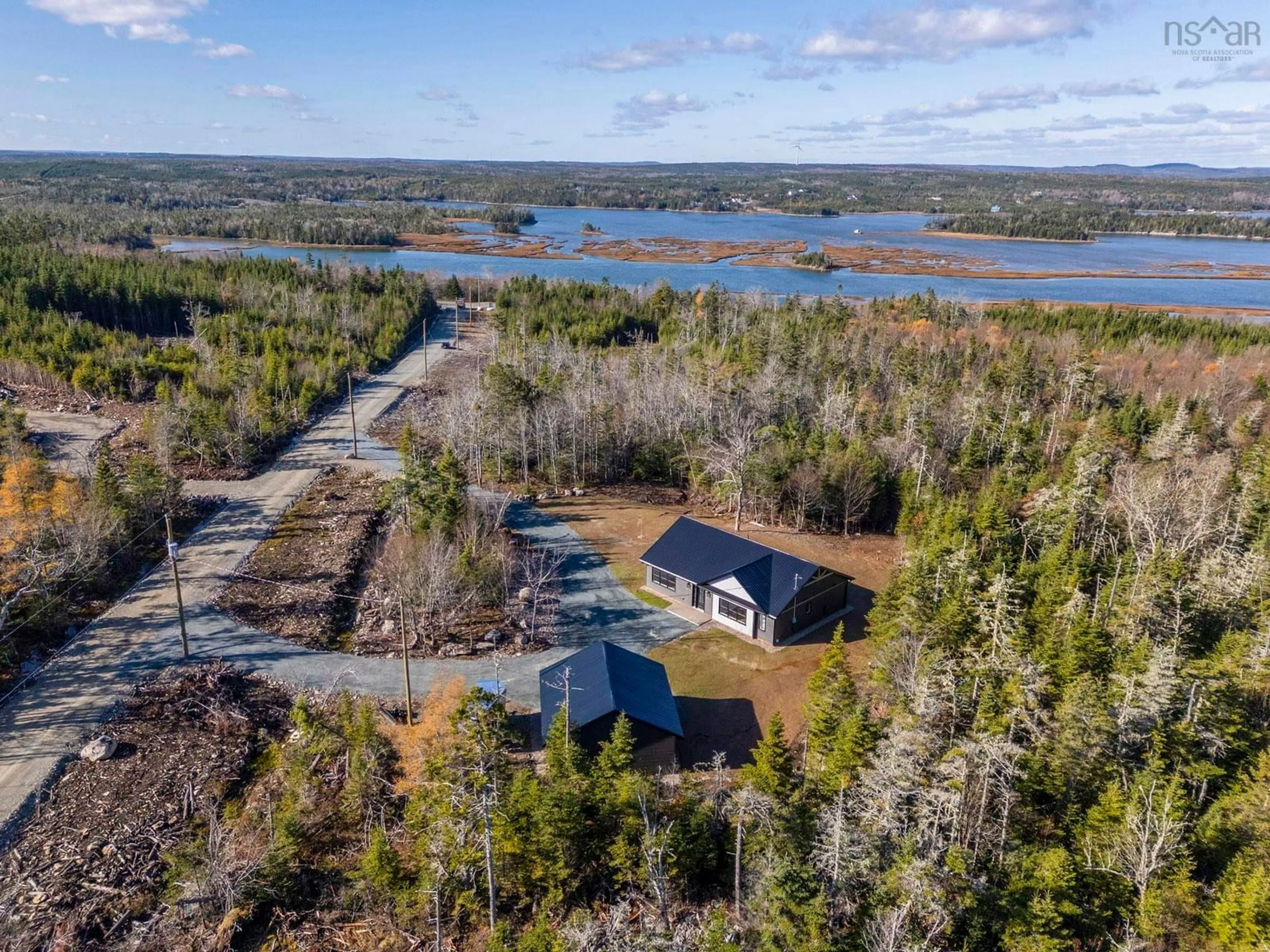 A pic from outside/outdoor area/front of a property/back of a property/a pic from drone, water/lake/river/ocean view for 70 Beau Run, East Petpeswick Nova Scotia B0J 2L0
