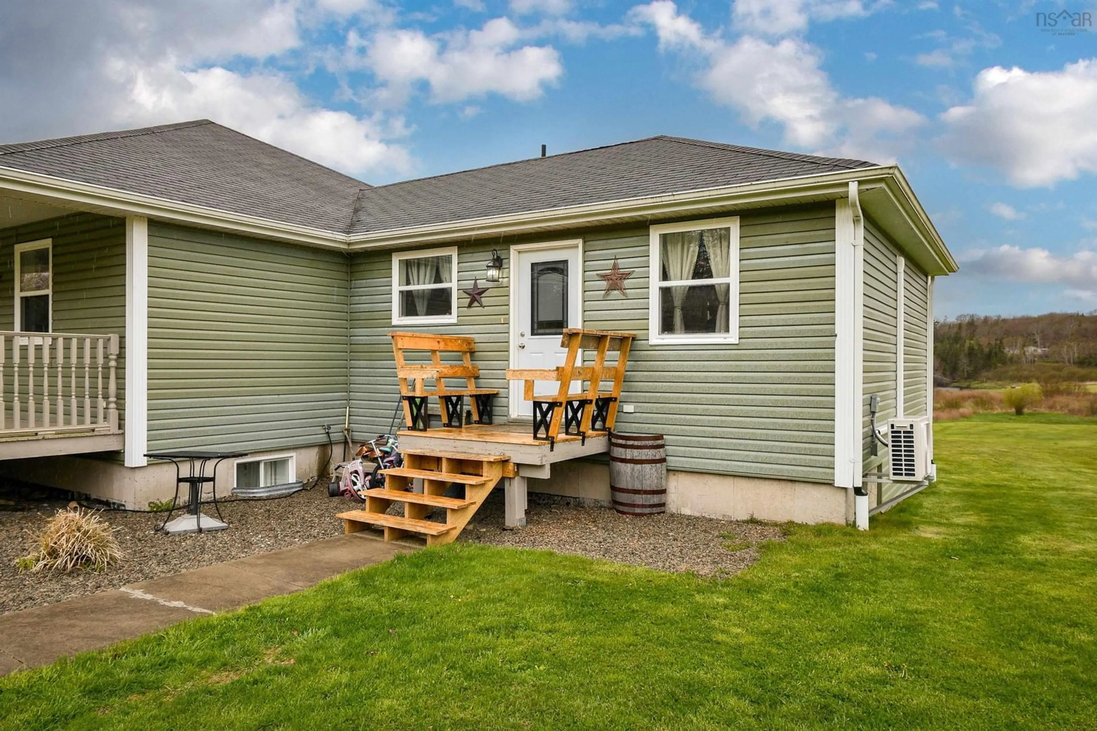 Home with vinyl exterior material, street for 4598 Grand Mira North, Grand Mira North Nova Scotia B1K 3V1