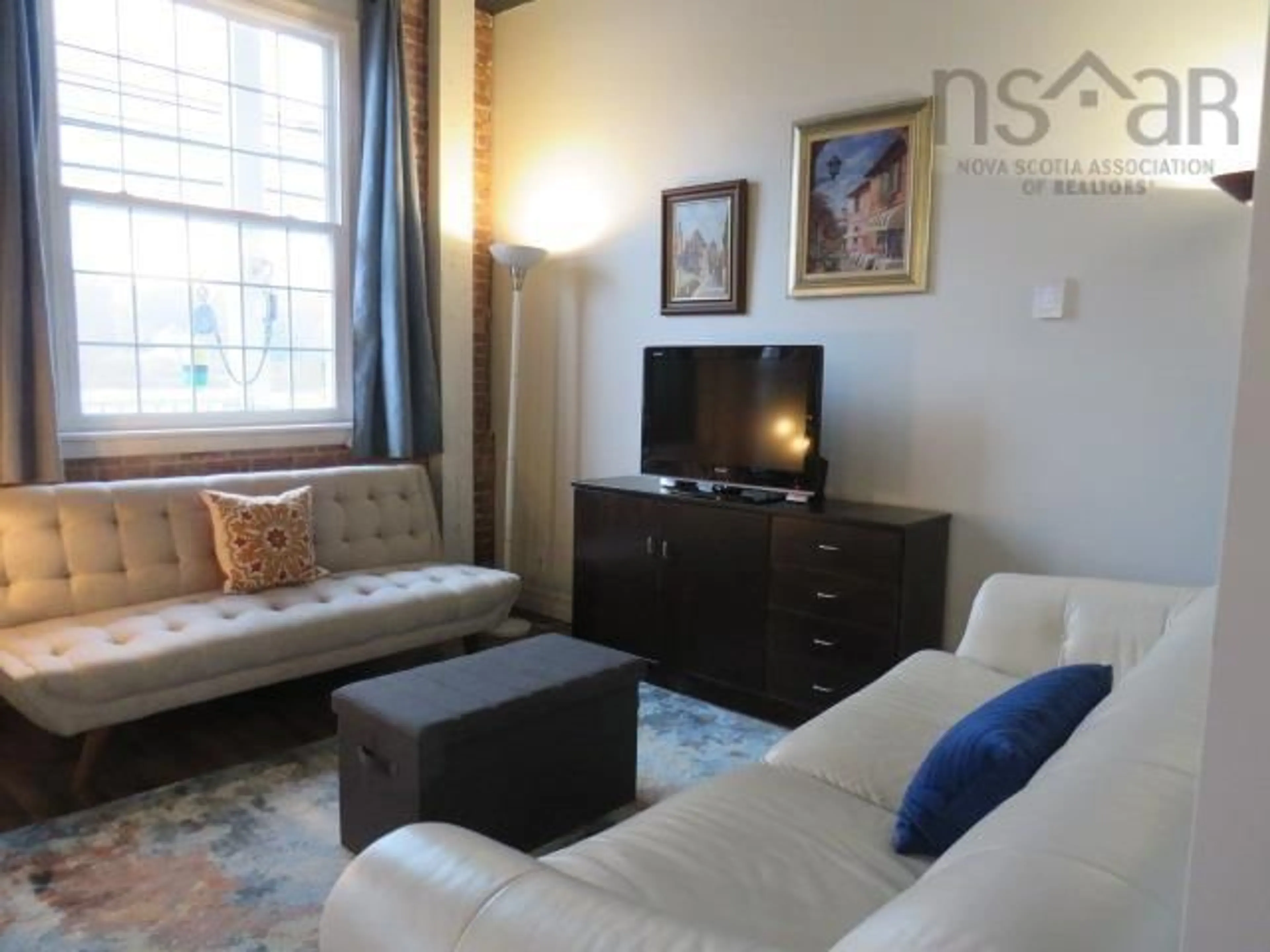 Living room with furniture, unknown for 215 King St #207, Bridgewater Nova Scotia B4V 1A6