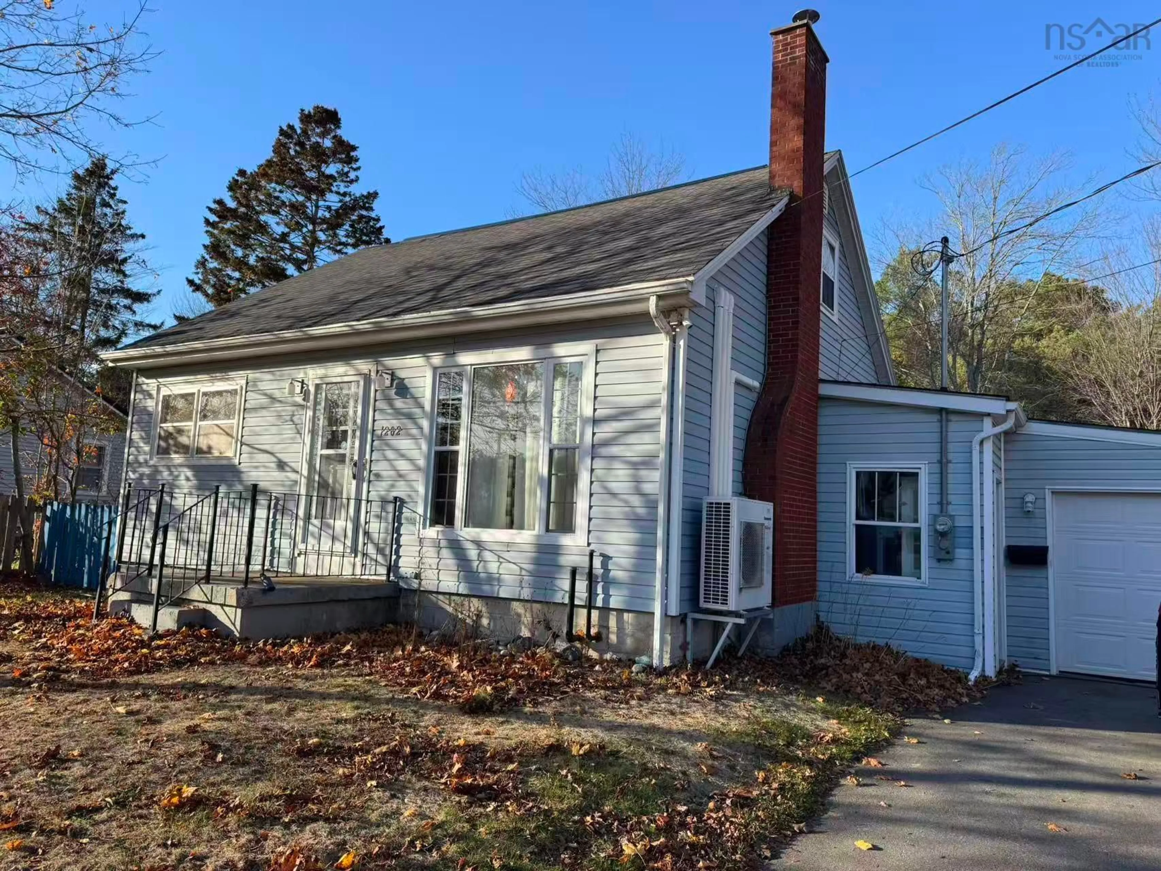 Home with vinyl exterior material, street for 1202 Owen Rd, Kentville Nova Scotia B4N 2W9