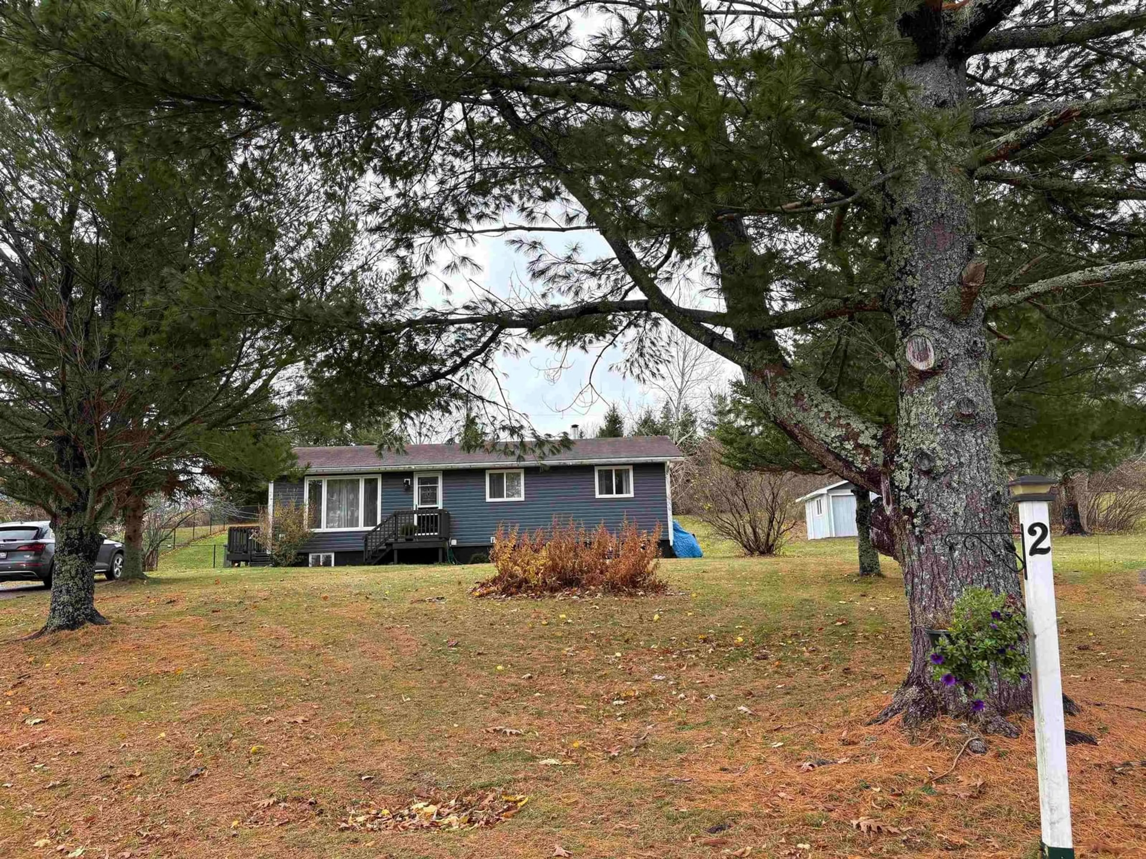 A pic from outside/outdoor area/front of a property/back of a property/a pic from drone, unknown for 2 Second St, Maclellan's Brook Nova Scotia B2H 5C7