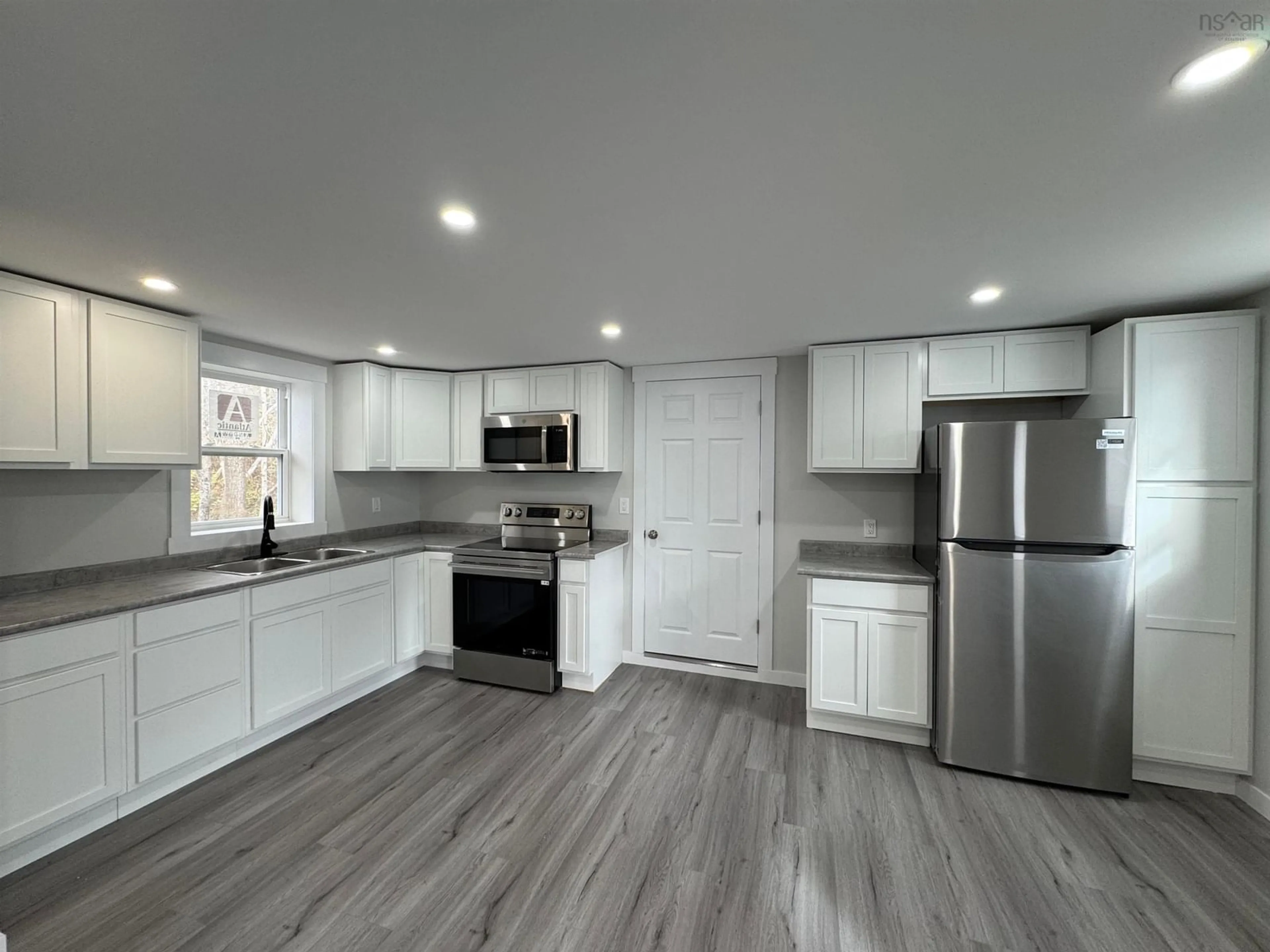 Open concept kitchen, unknown for 164 Granville St, Port Hawkesbury Nova Scotia B9A 2G1