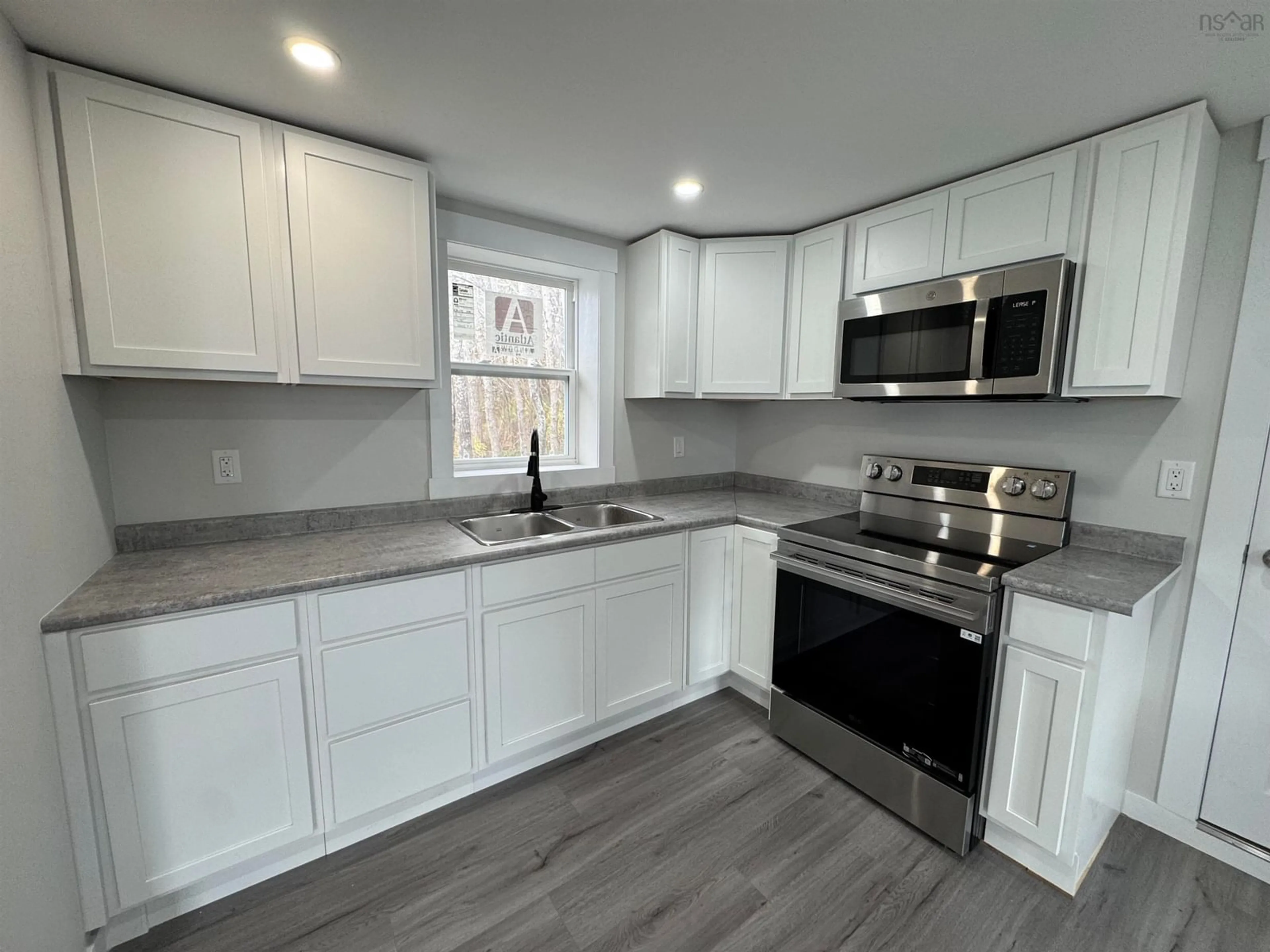 Open concept kitchen, unknown for 164 Granville St, Port Hawkesbury Nova Scotia B9A 2G1