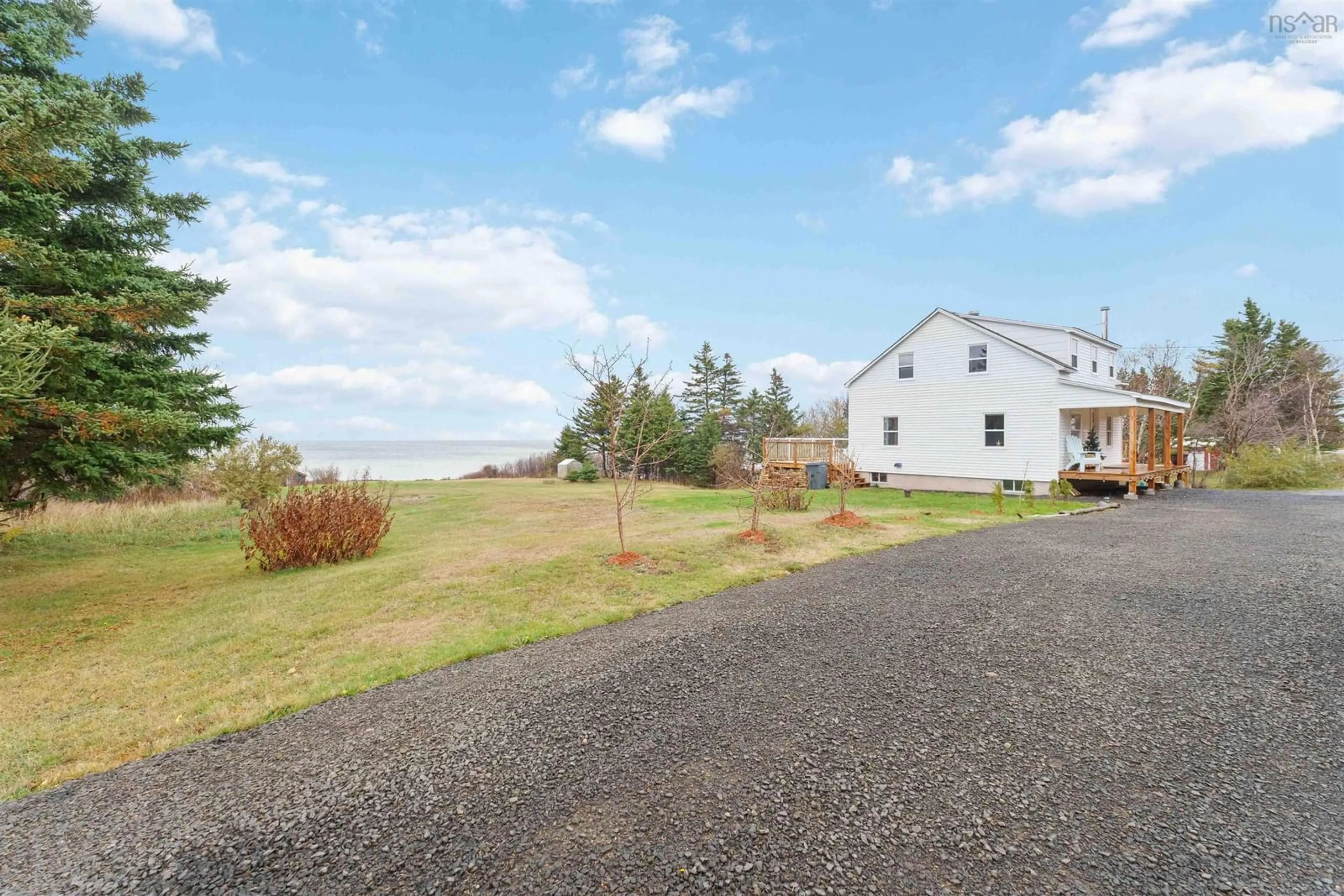 A pic from outside/outdoor area/front of a property/back of a property/a pic from drone, water/lake/river/ocean view for 6911 Shore Rd West Rd, Phinneys Cove Nova Scotia B0S 1L0