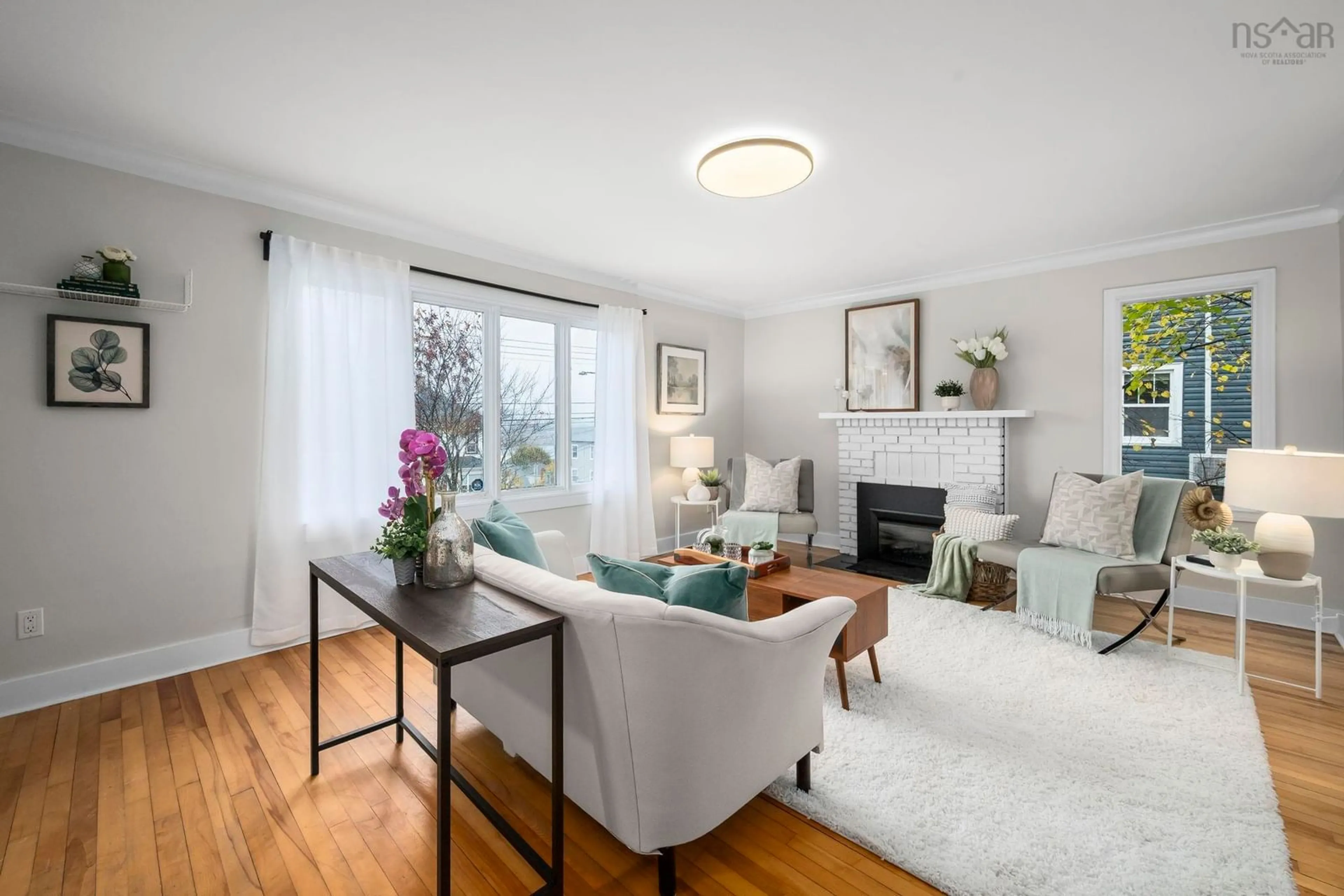 Living room with furniture, wood/laminate floor for 3224 Devonshire Ave, Halifax Nova Scotia B3K 3M2