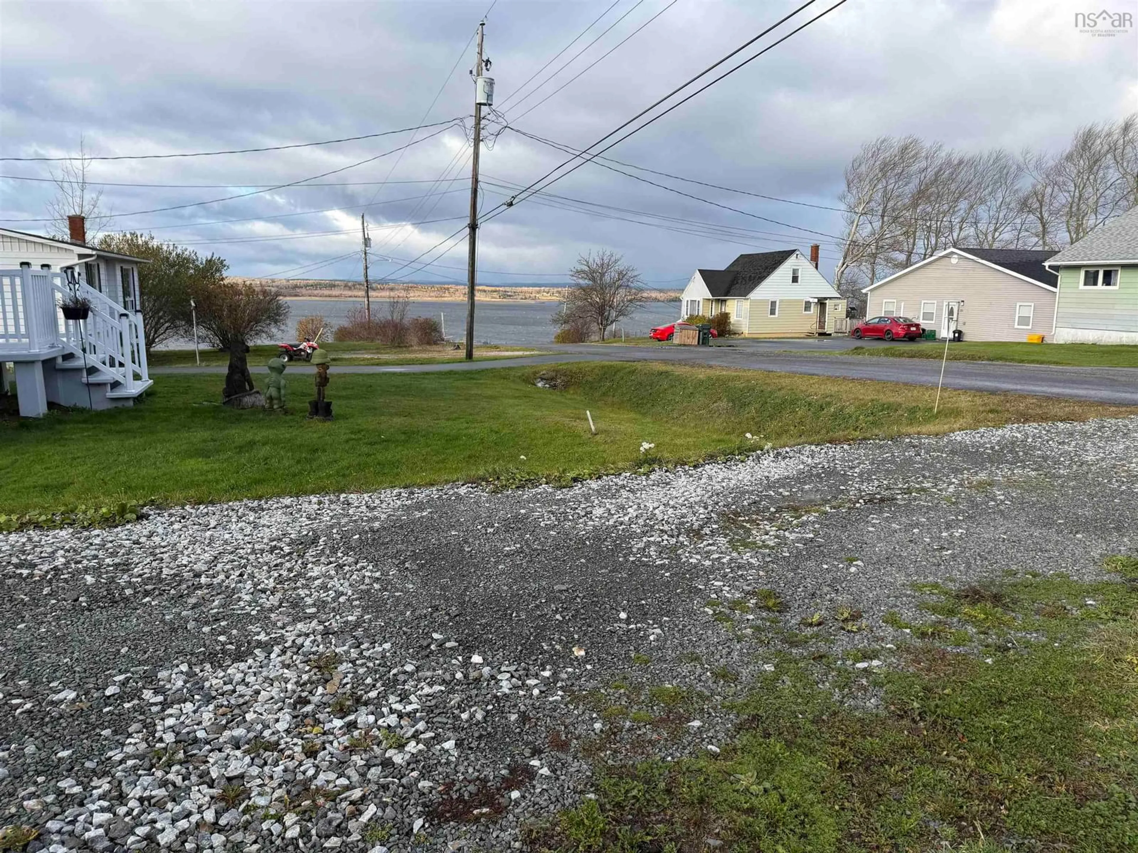 A pic from outside/outdoor area/front of a property/back of a property/a pic from drone, water/lake/river/ocean view for 14/16 Macleod St, South Bar Nova Scotia B1N 3H4