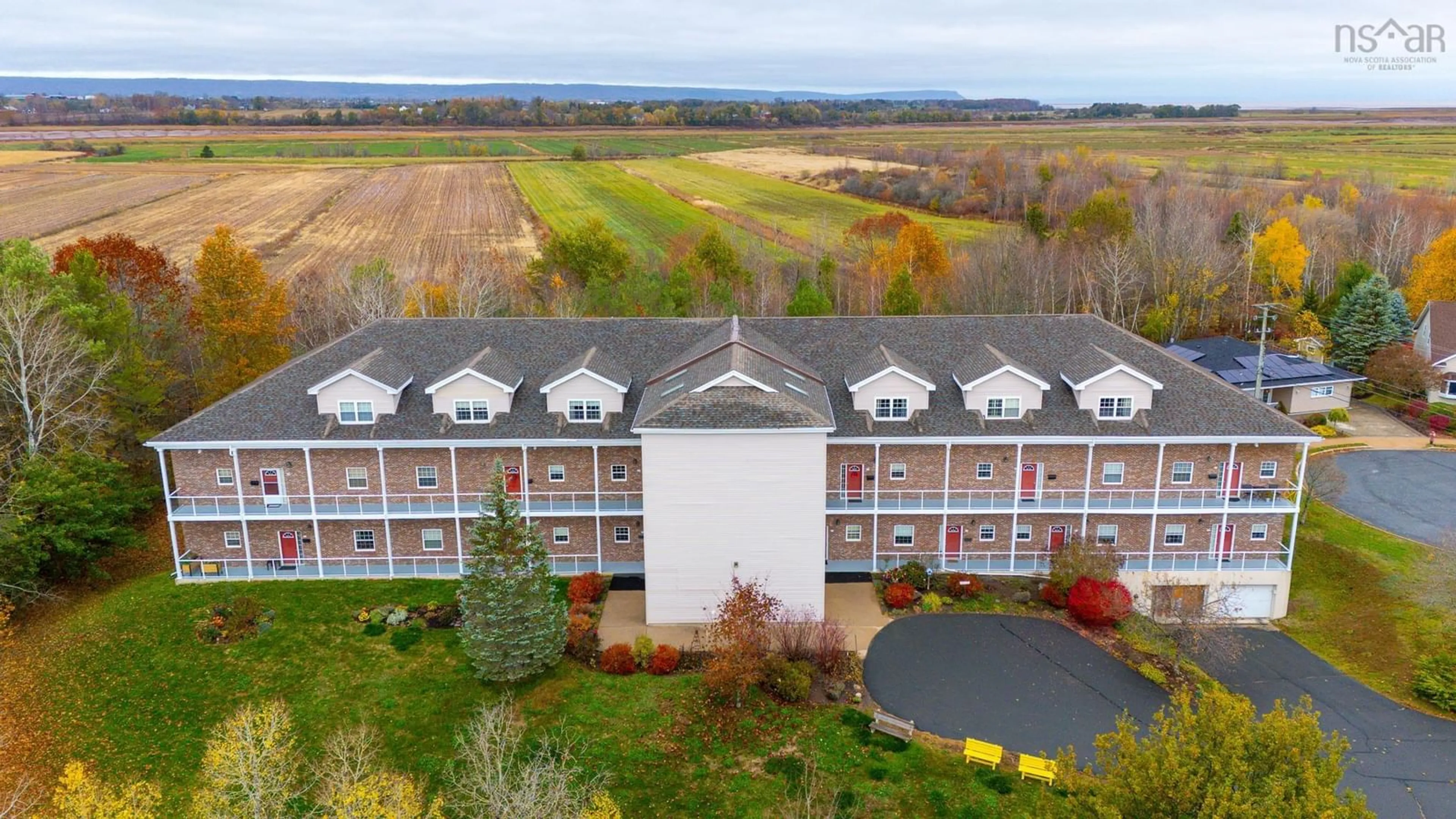 A pic from outside/outdoor area/front of a property/back of a property/a pic from drone, unknown for 71 Chambers Close #203, Wolfville Nova Scotia B4P 2S8