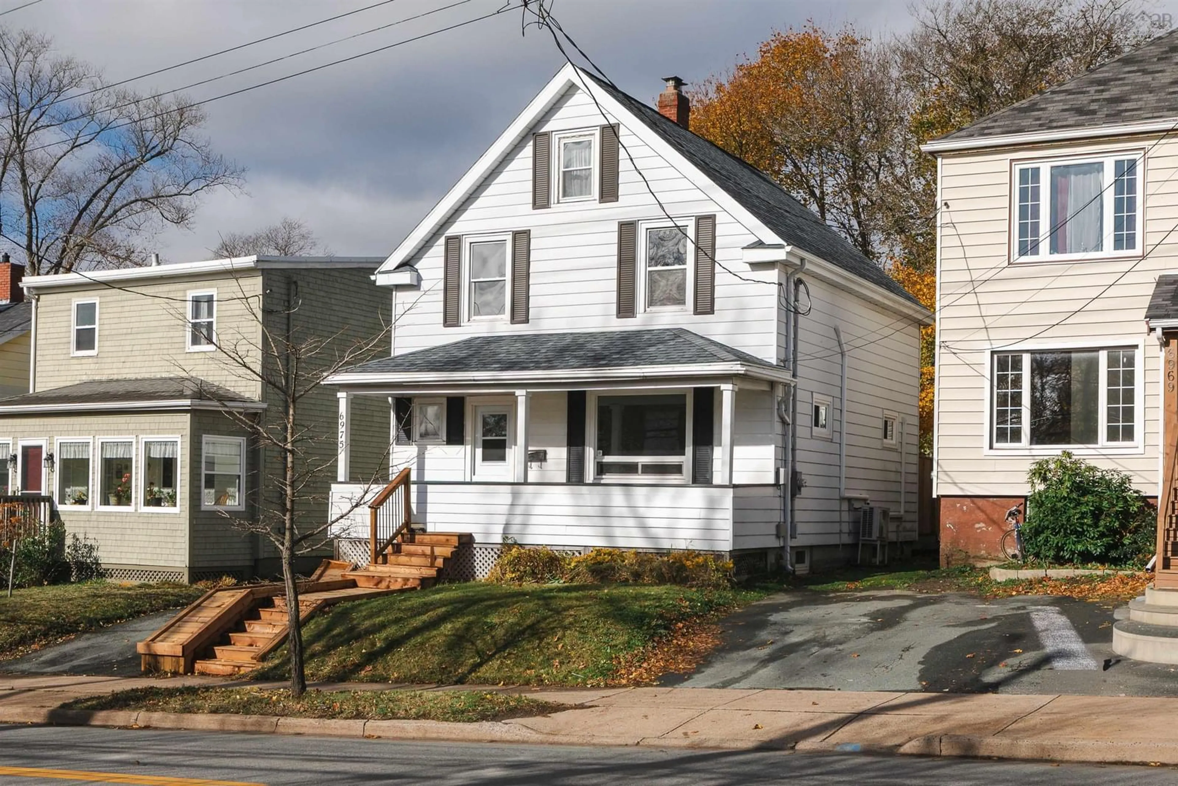 Home with vinyl exterior material, street for 6975 Chebucto Rd, Halifax Nova Scotia B3L 1M6