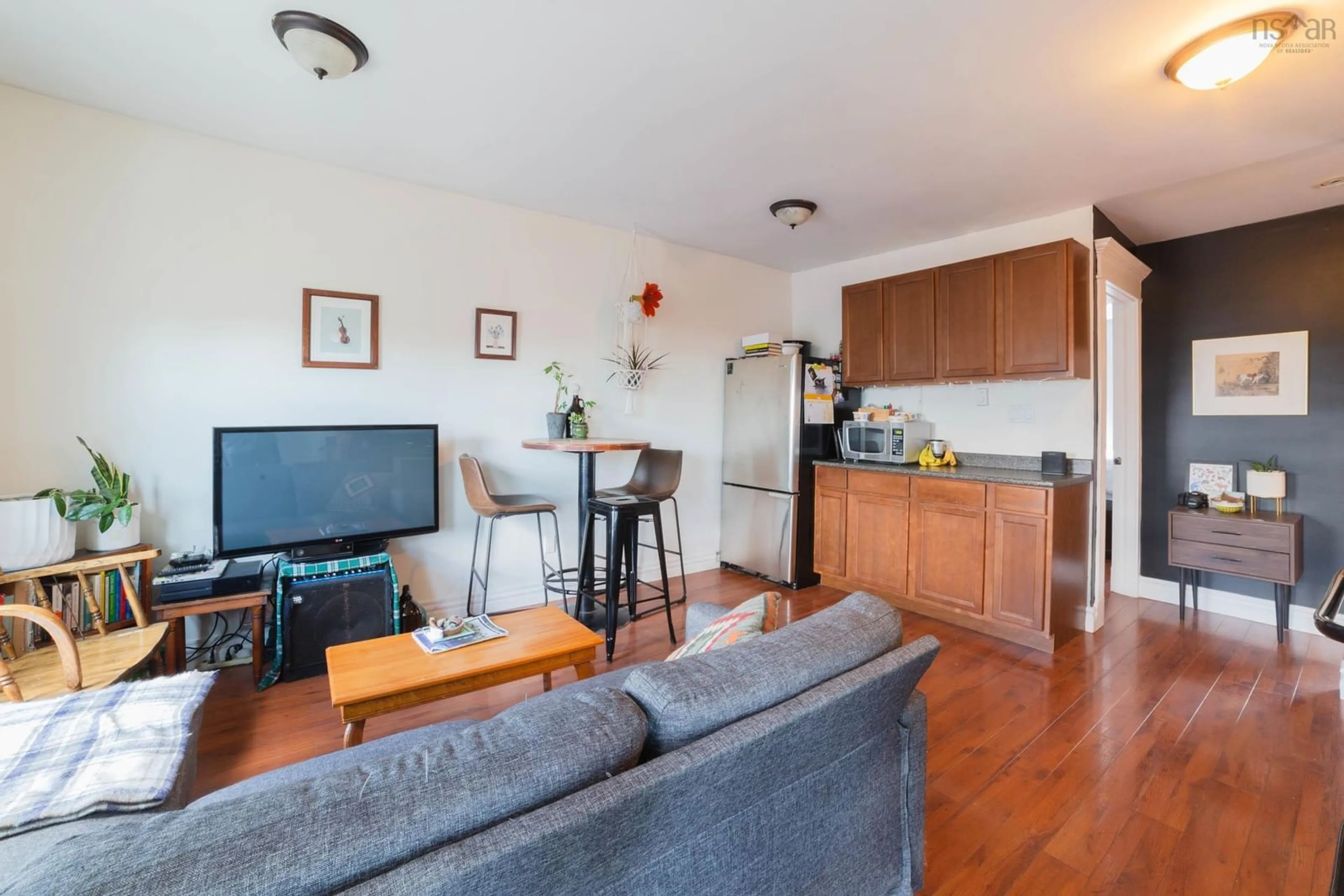 Living room with furniture, wood/laminate floor for 2344 Creighton St, Halifax Nova Scotia B3K 3R6