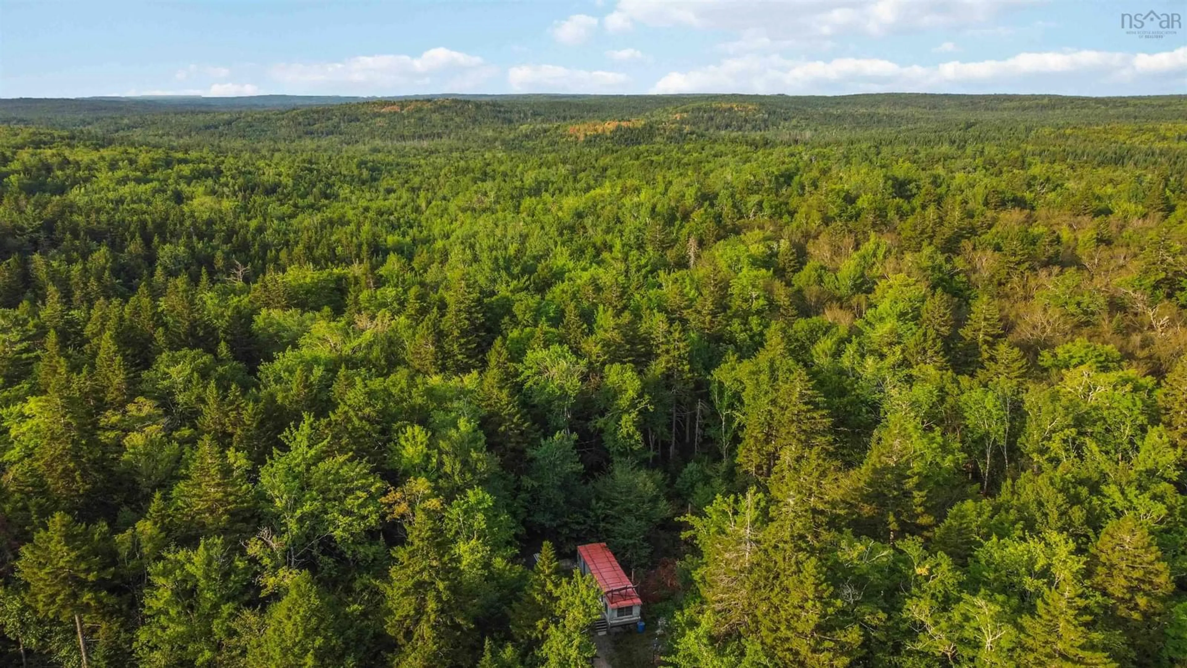 A pic from outside/outdoor area/front of a property/back of a property/a pic from drone, forest/trees view for 512 Eagle Rock Dr, Franey Corner Nova Scotia B0R 1H0