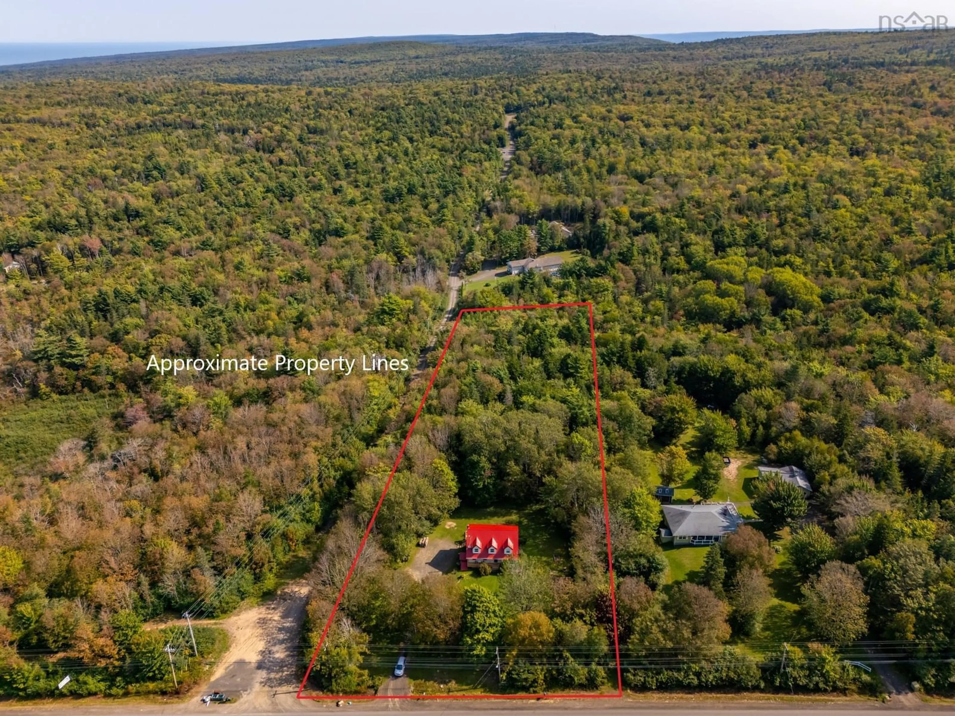 A pic from outside/outdoor area/front of a property/back of a property/a pic from drone, forest/trees view for 790 Parker Mountain Rd, Parkers Cove Nova Scotia B0S 1A0
