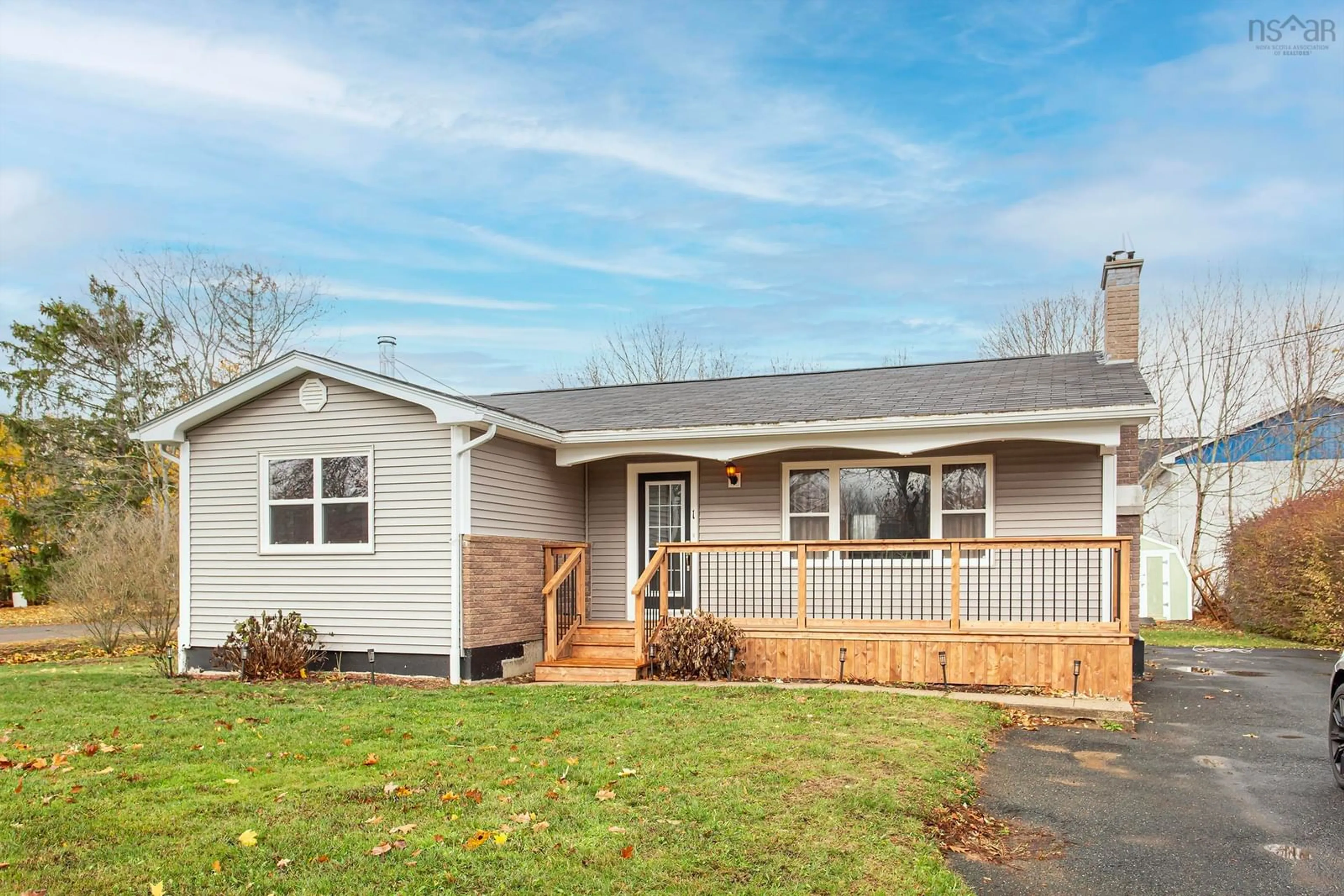 Home with vinyl exterior material, street for 1 Ross Lane, Middleton Nova Scotia B0S 1P0