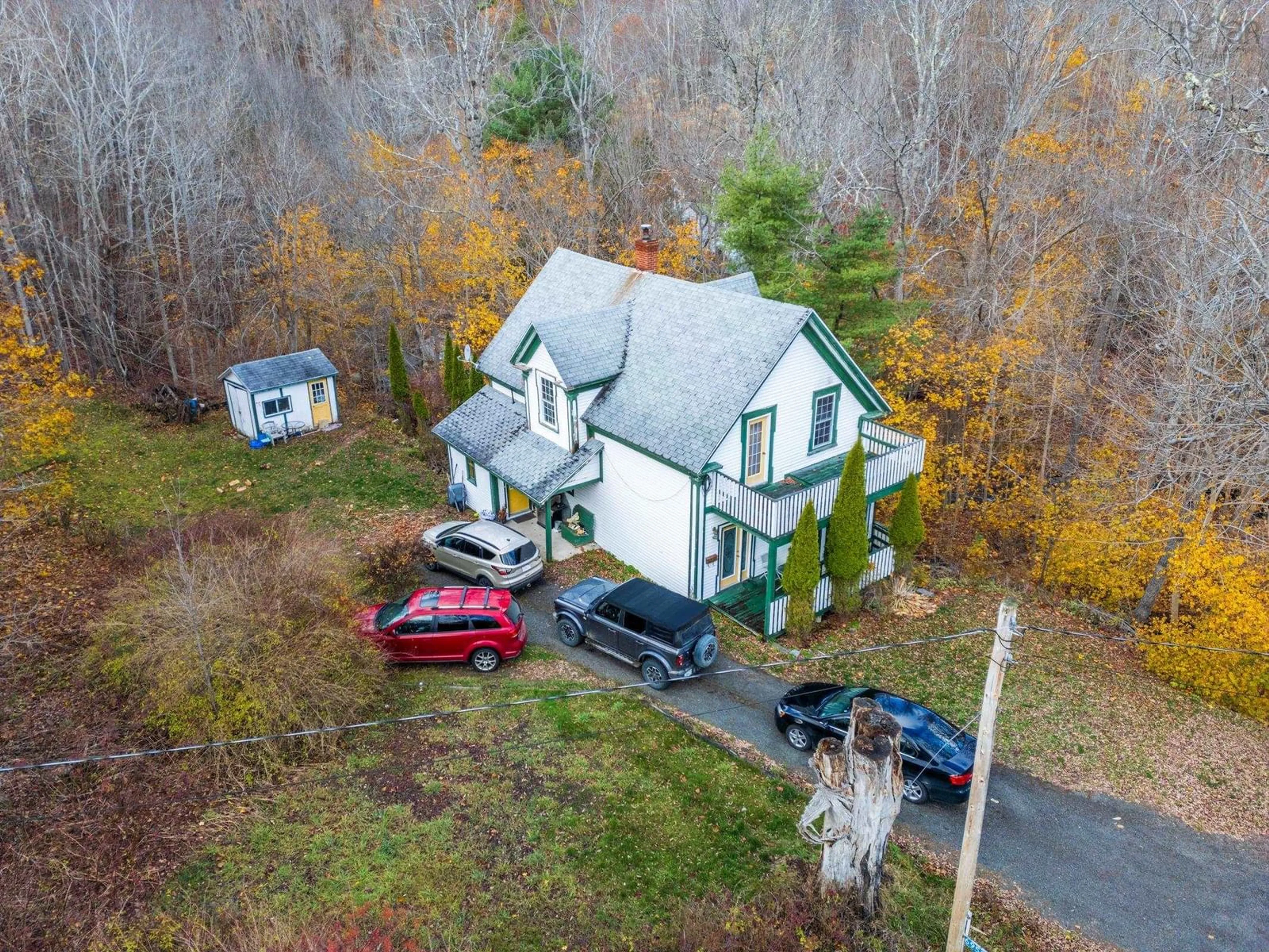 A pic from outside/outdoor area/front of a property/back of a property/a pic from drone, street for 6953 Sissiboo Road, Bear River Nova Scotia B0S 1B0