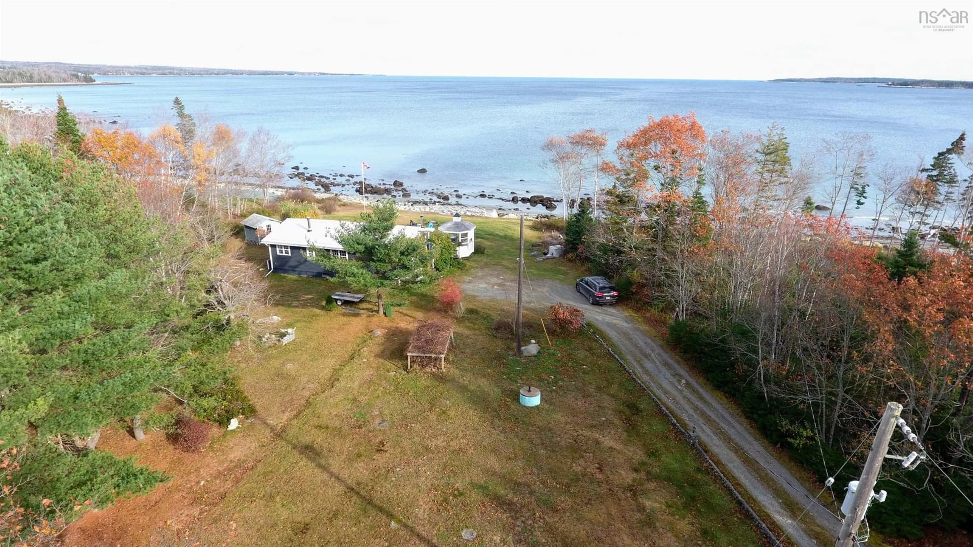 A pic from outside/outdoor area/front of a property/back of a property/a pic from drone, water/lake/river/ocean view for 258 Bells Point Rd, Port Mouton Nova Scotia B0T 1T0