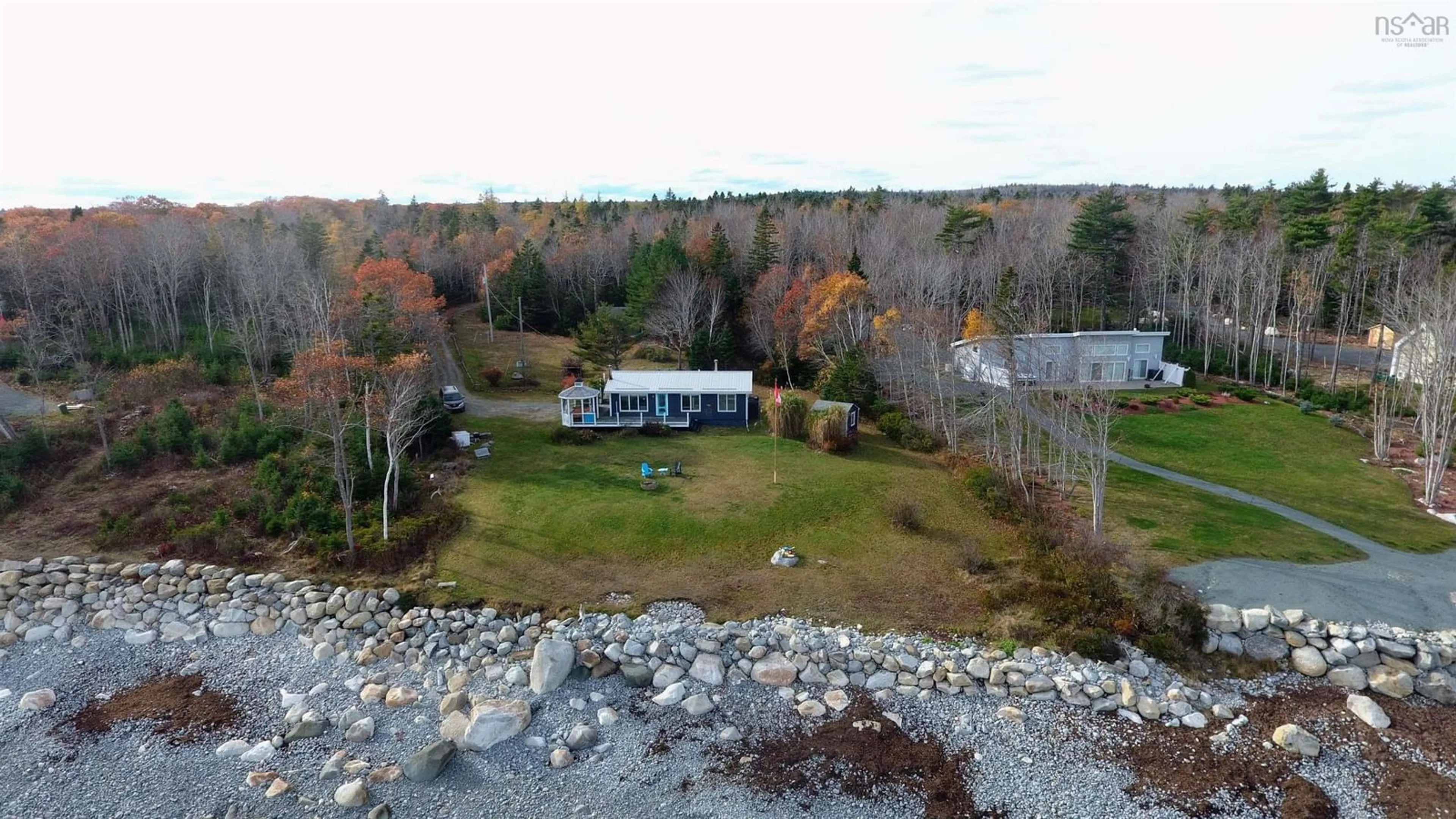 A pic from outside/outdoor area/front of a property/back of a property/a pic from drone, water/lake/river/ocean view for 258 Bells Point Rd, Port Mouton Nova Scotia B0T 1T0