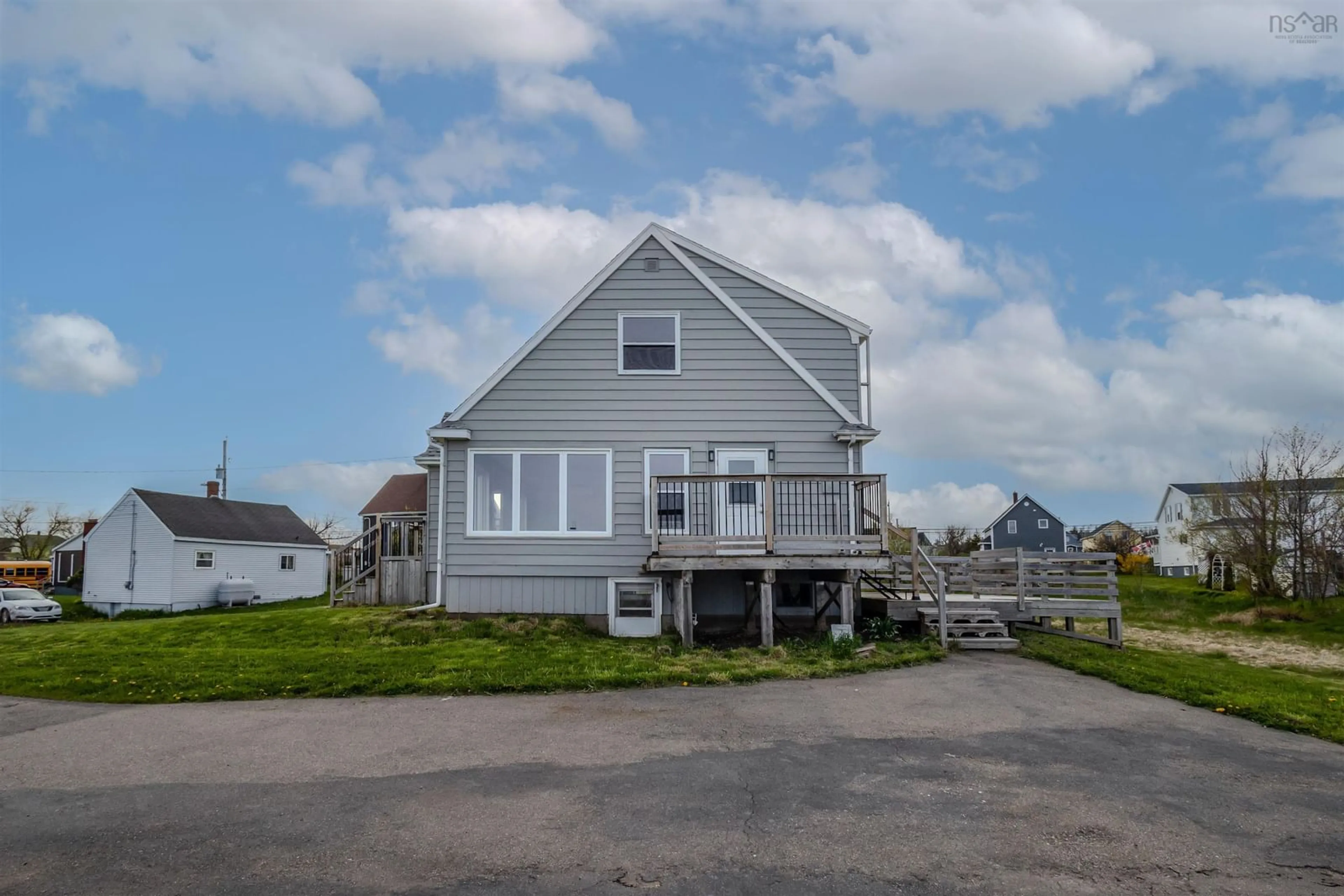 Home with vinyl exterior material, street for 59 Cliff St, Port Morien Nova Scotia B1B 1B4