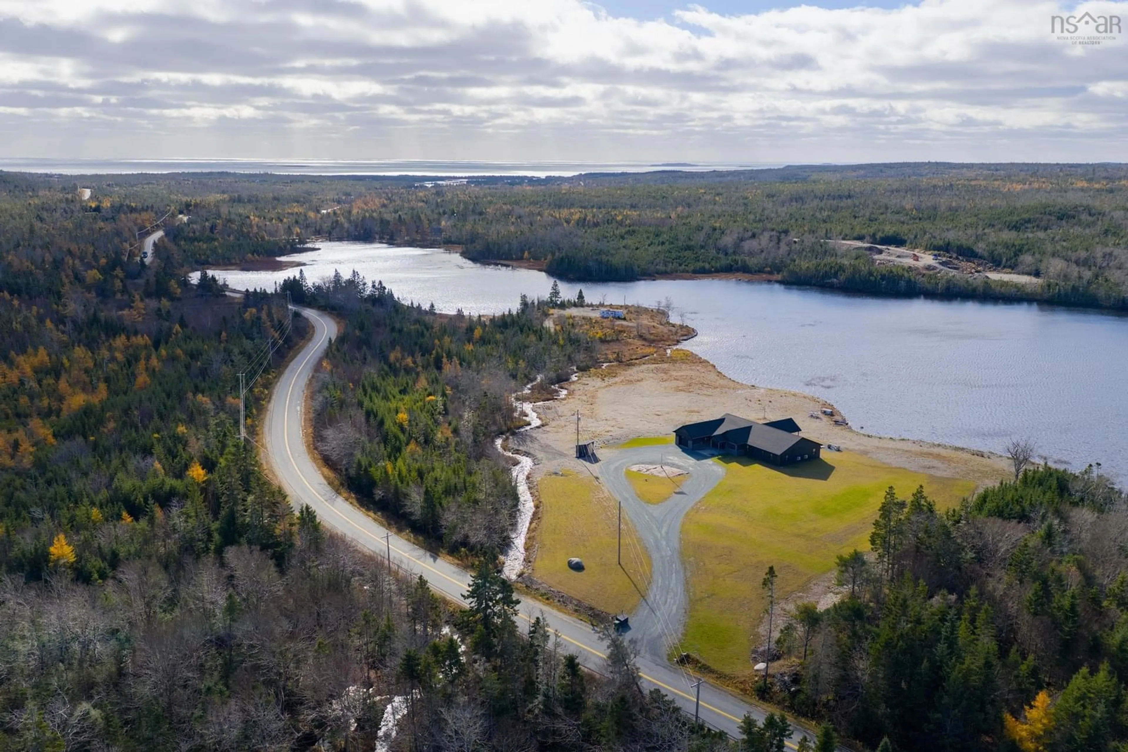A pic from outside/outdoor area/front of a property/back of a property/a pic from drone, water/lake/river/ocean view for 5121 Clam Harbour Rd, Lake Charlotte Nova Scotia B0J 2L0