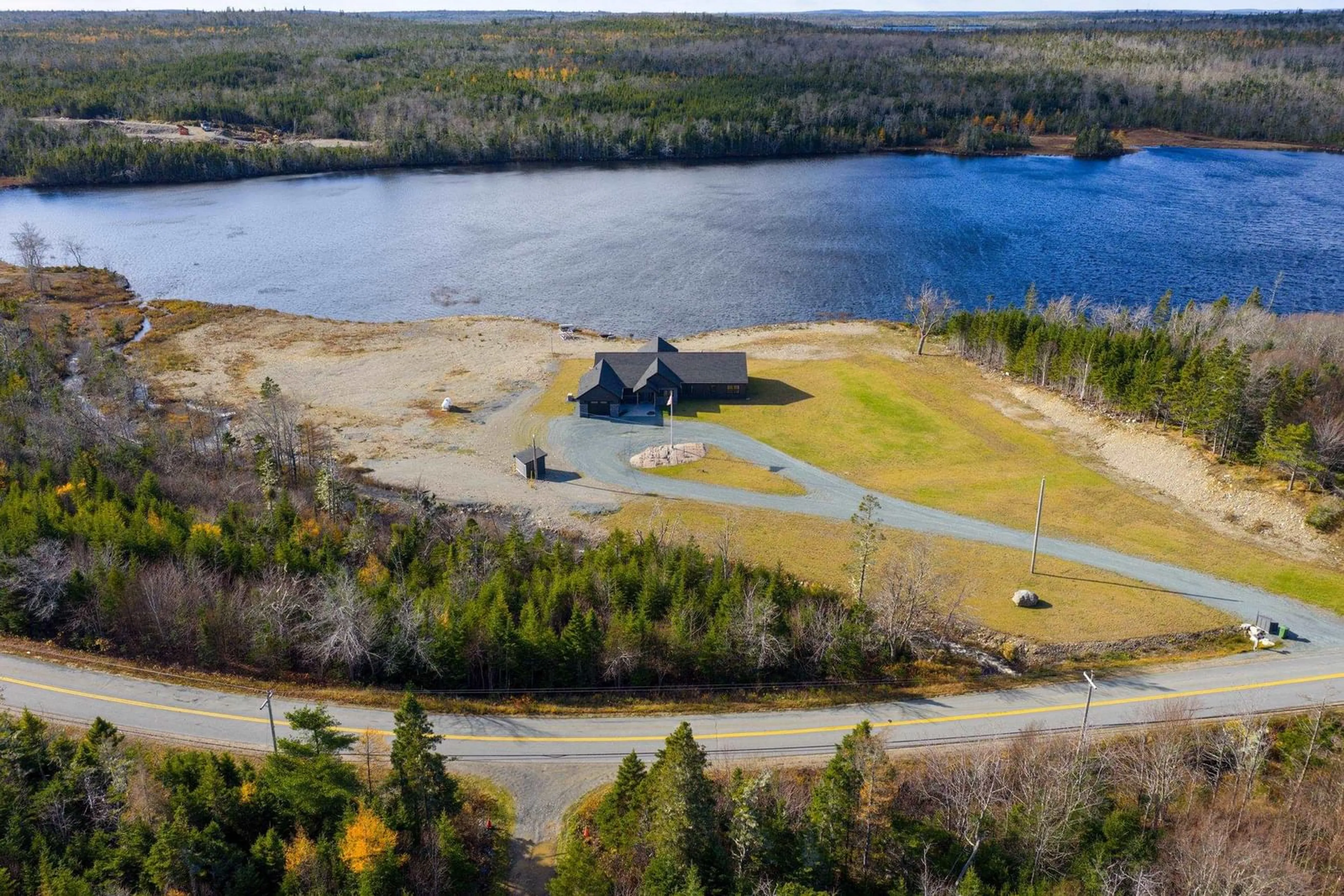 A pic from outside/outdoor area/front of a property/back of a property/a pic from drone, water/lake/river/ocean view for 5121 Clam Harbour Rd, Lake Charlotte Nova Scotia B0J 2L0