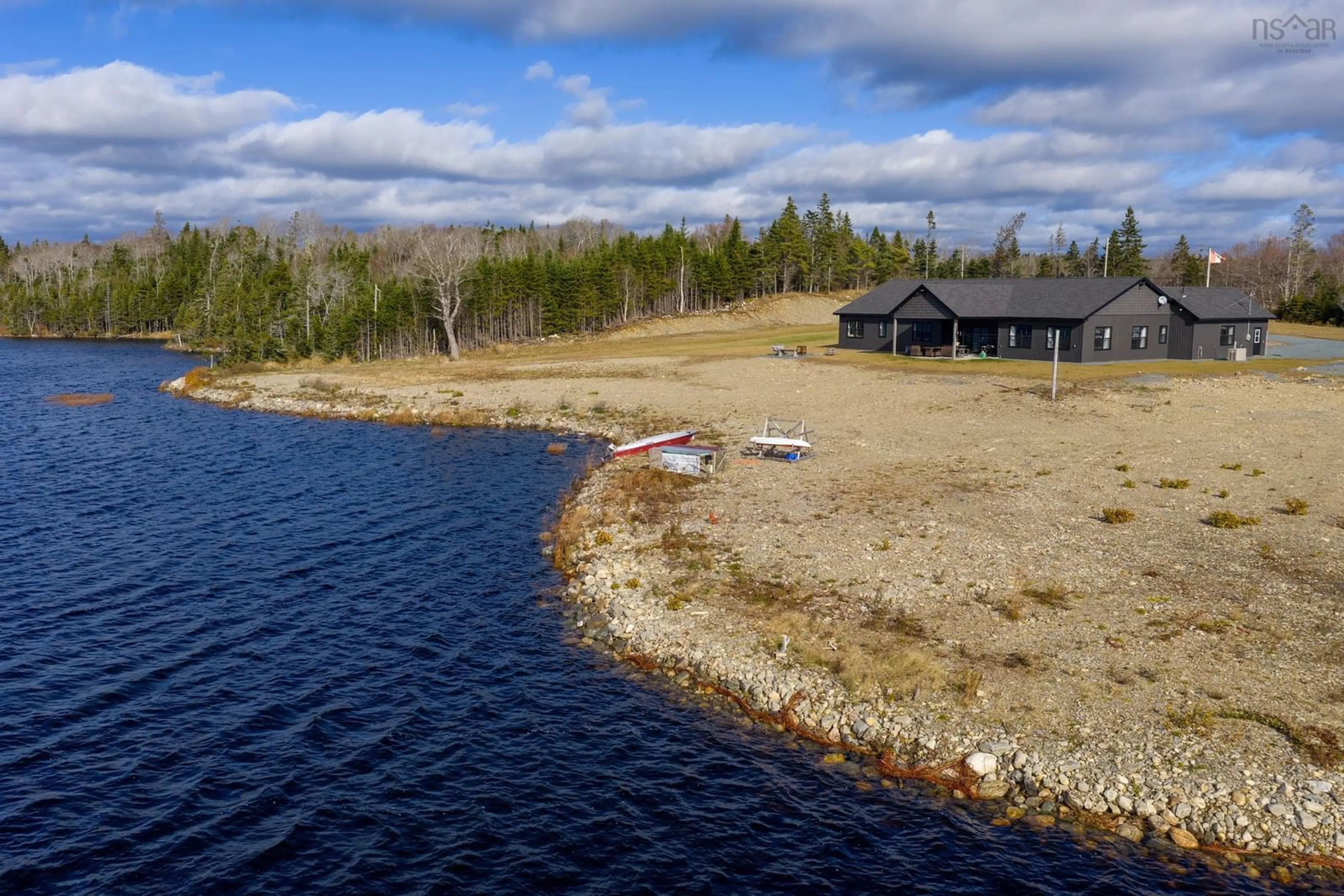 A pic from outside/outdoor area/front of a property/back of a property/a pic from drone, water/lake/river/ocean view for 5121 Clam Harbour Rd, Lake Charlotte Nova Scotia B0J 2L0