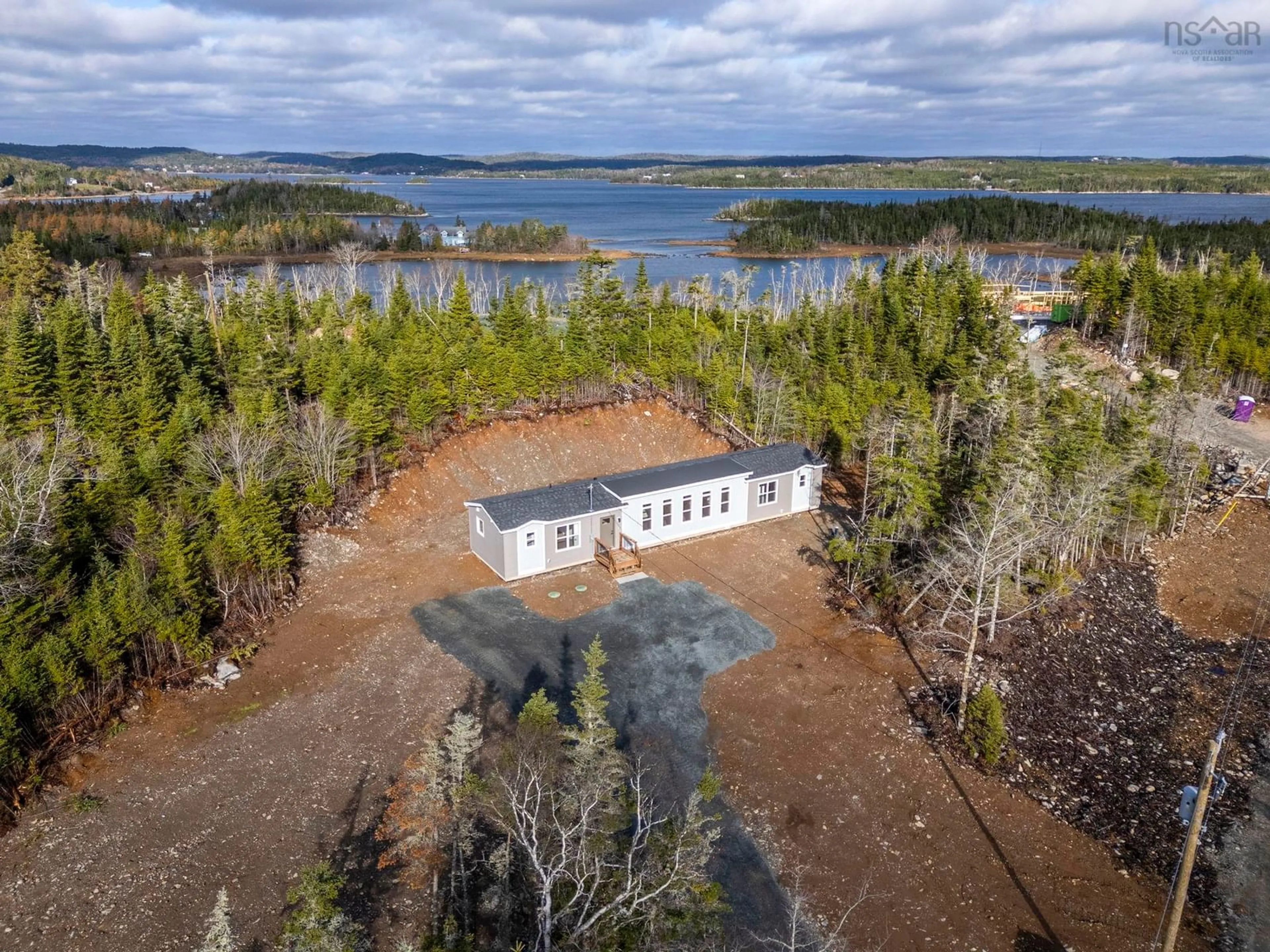 A pic from outside/outdoor area/front of a property/back of a property/a pic from drone, water/lake/river/ocean view for 14 Seacrest Way, West Jeddore Nova Scotia B0J 1P0