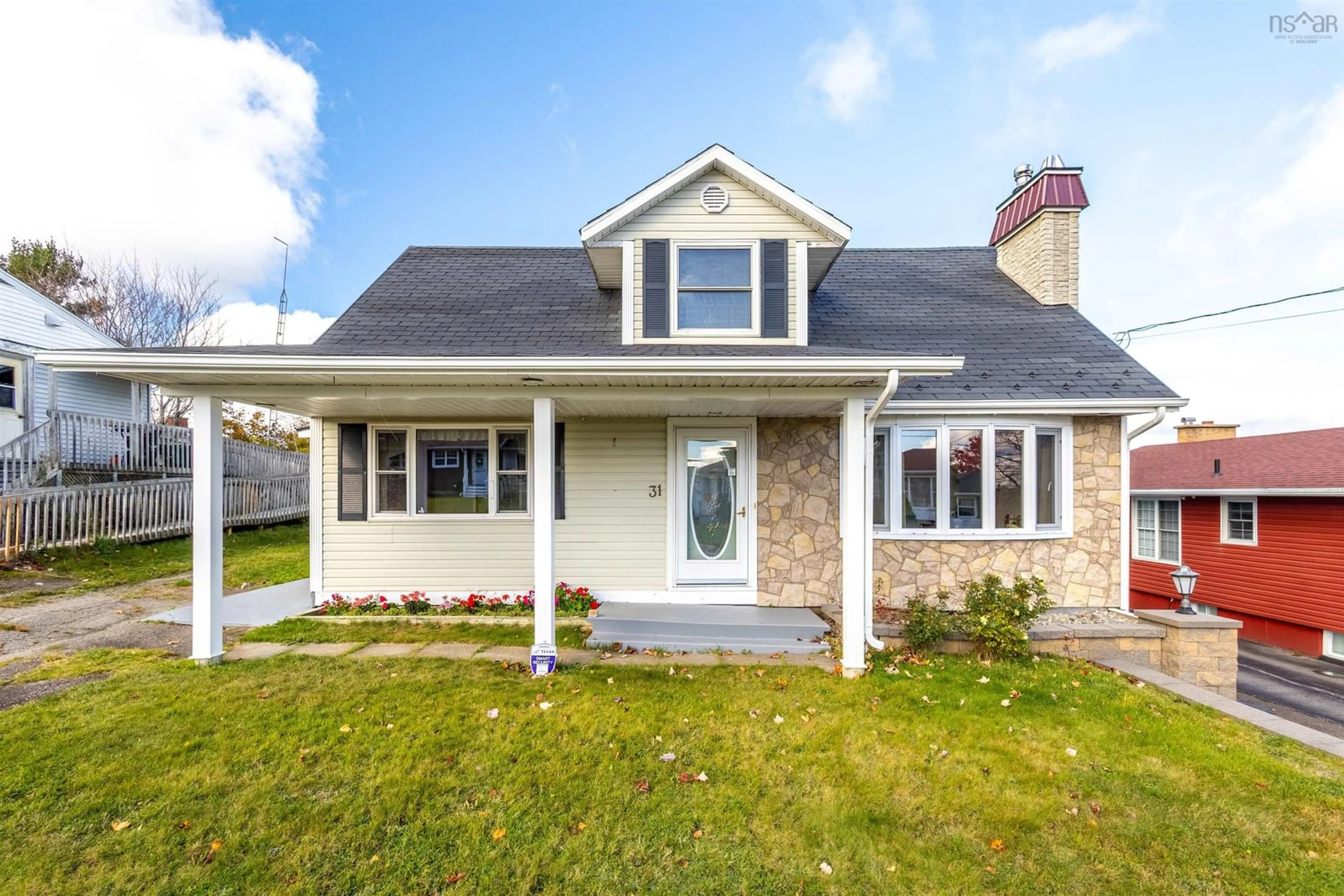 Home with vinyl exterior material, street for 31 Kennedy Ave, Sydney Nova Scotia B1P 3K5