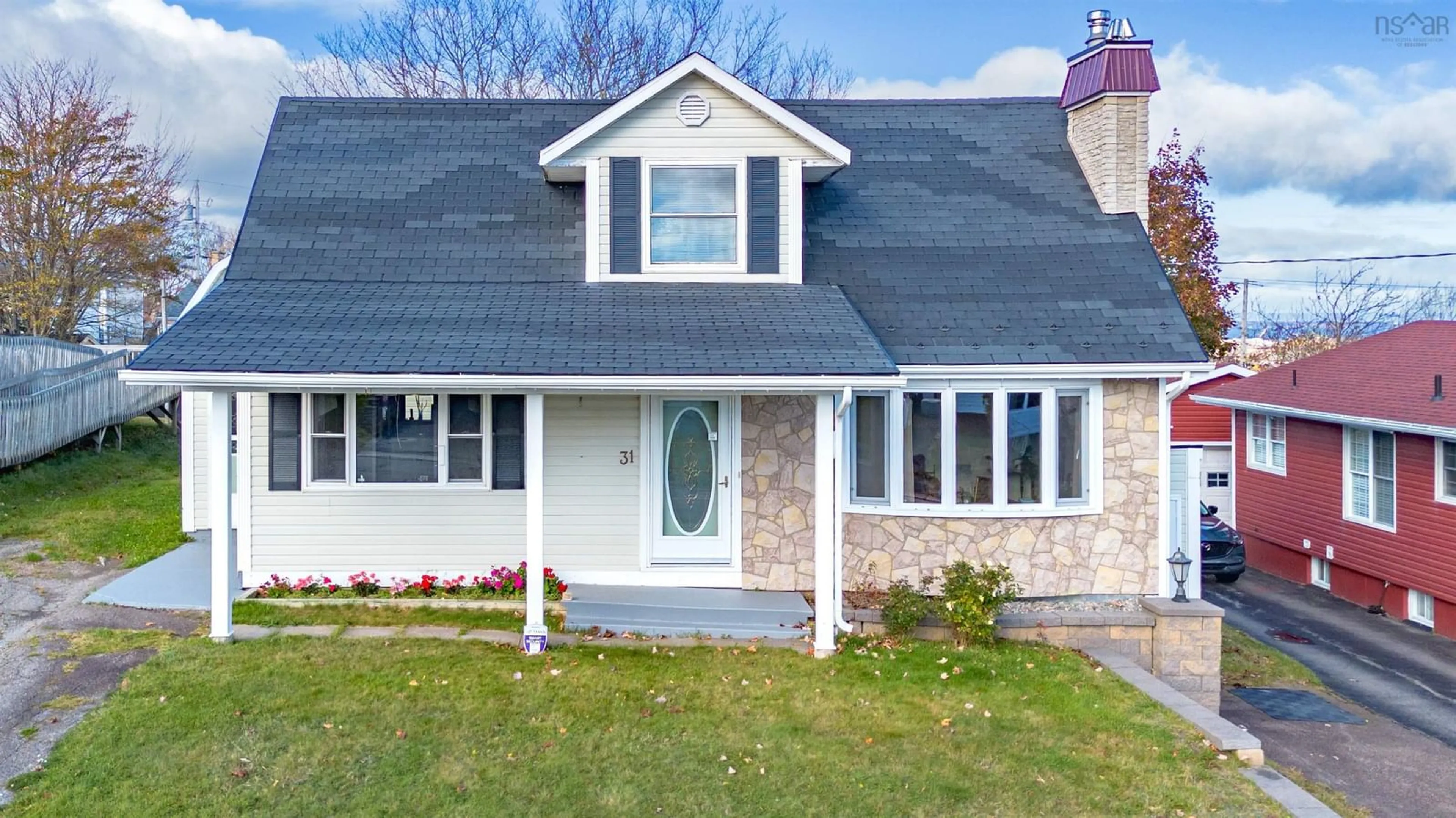 Home with vinyl exterior material, street for 31 Kennedy Ave, Sydney Nova Scotia B1P 3K5
