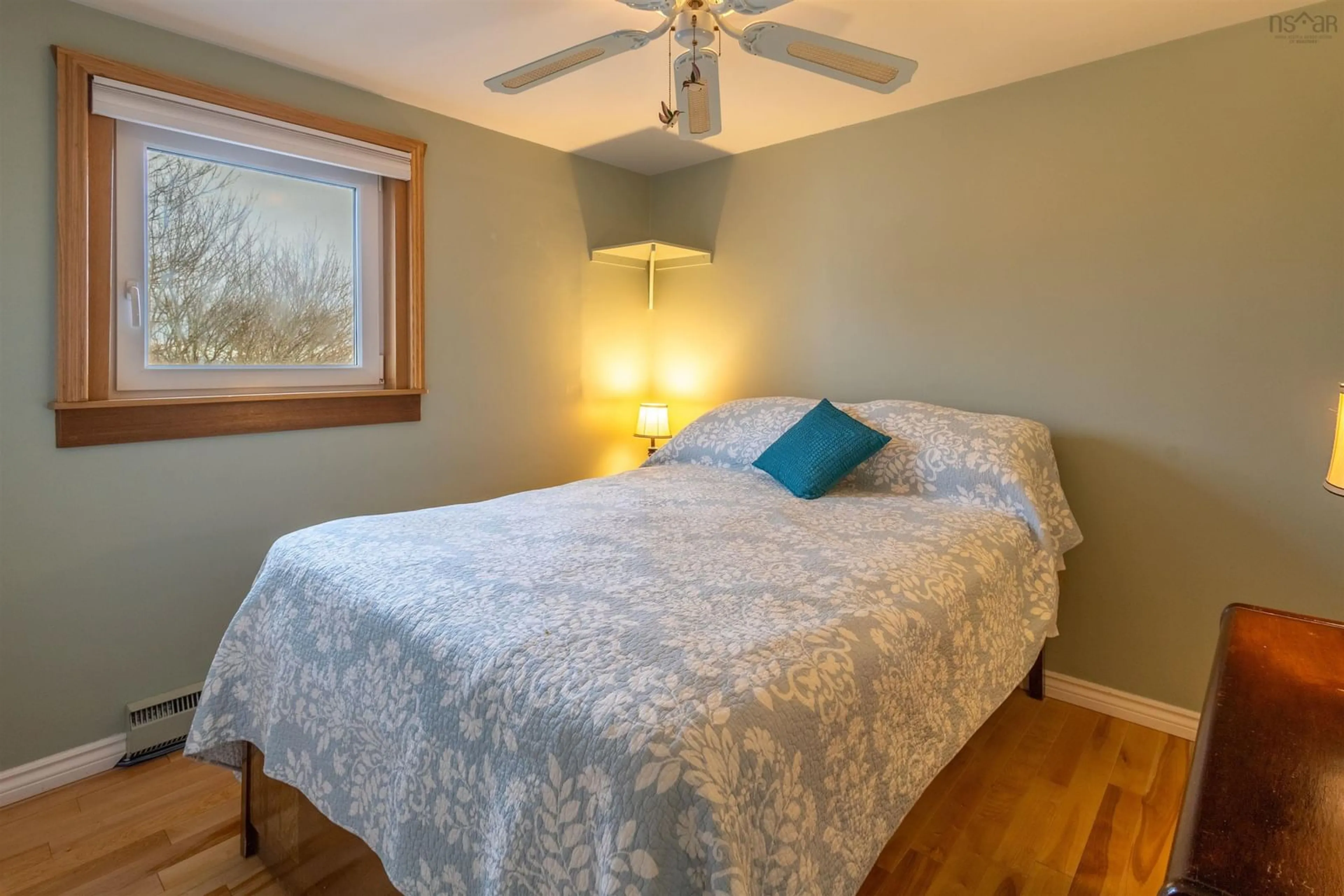 Bedroom with bed, wood/laminate floor for 31 Kennedy Ave, Sydney Nova Scotia B1P 3K5