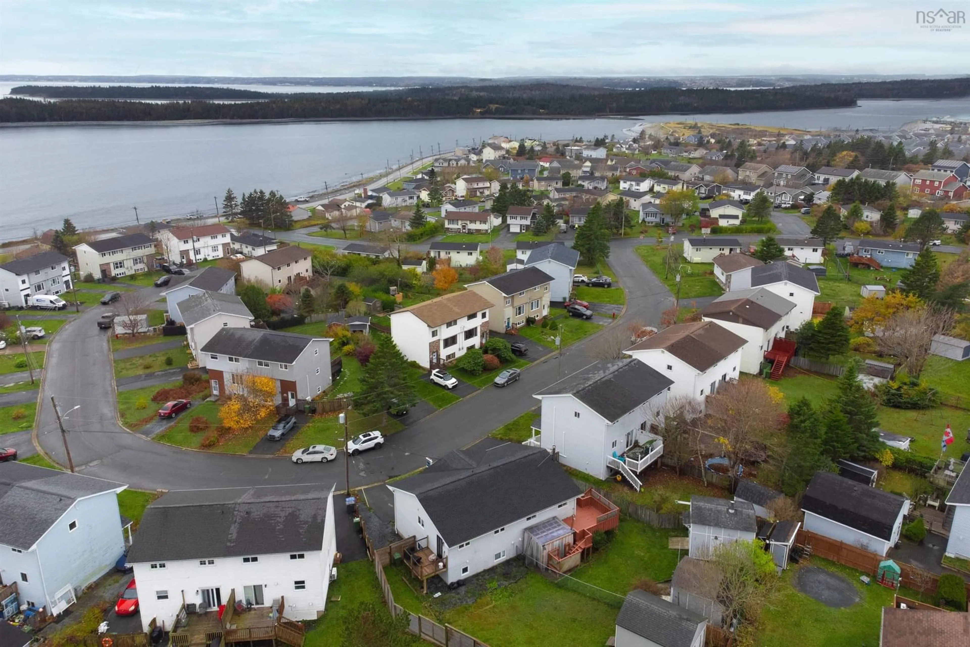 A pic from outside/outdoor area/front of a property/back of a property/a pic from drone, water/lake/river/ocean view for 63 Cannon Cres, Eastern Passage Nova Scotia B3G 1E9