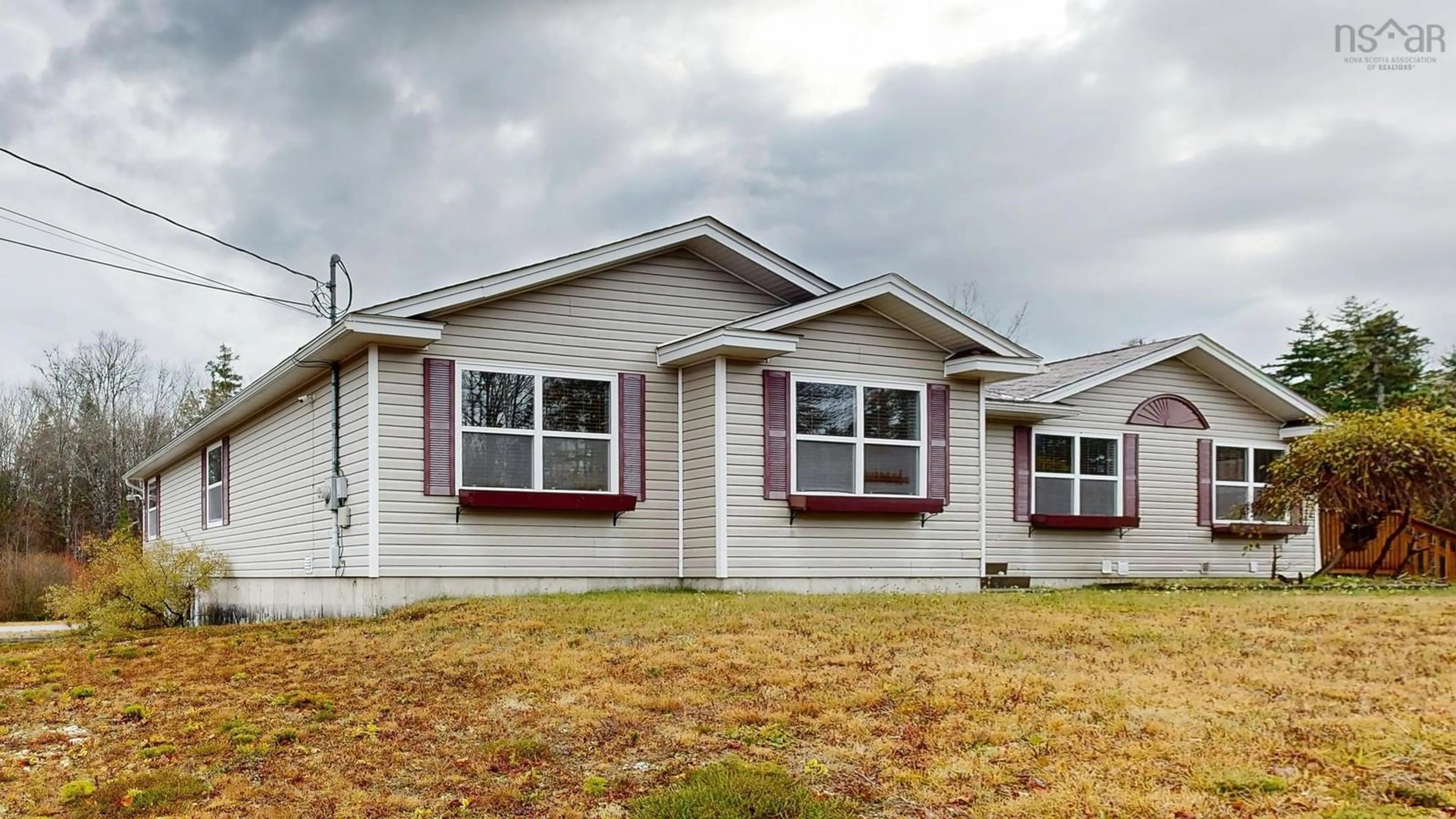 Home with vinyl exterior material, street for 2905 Highway 3, Brass Hill Nova Scotia B0W 1E0