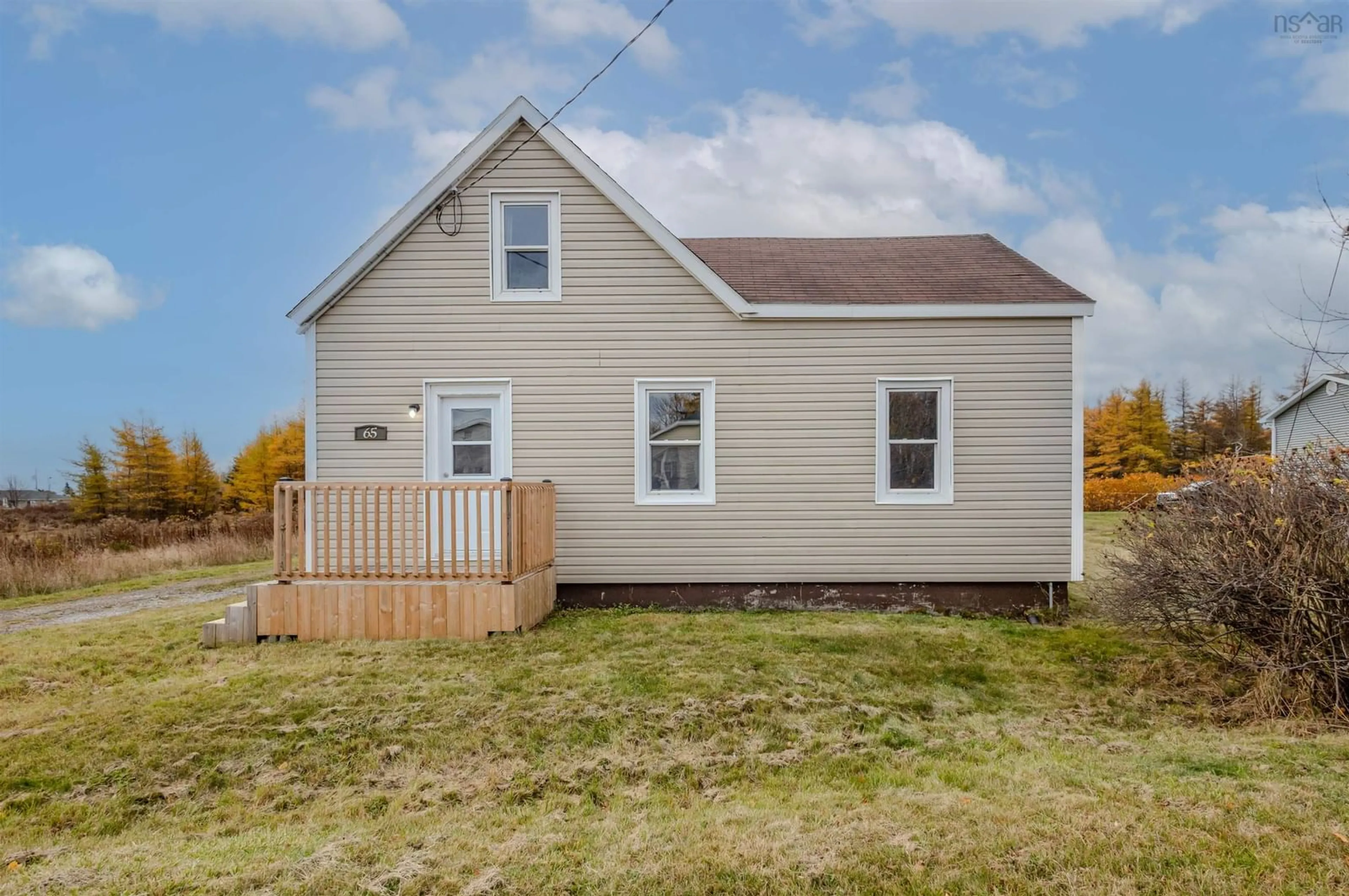 Home with vinyl exterior material, street for 65 Rear Main St, Reserve Mines Nova Scotia B1E 1H4