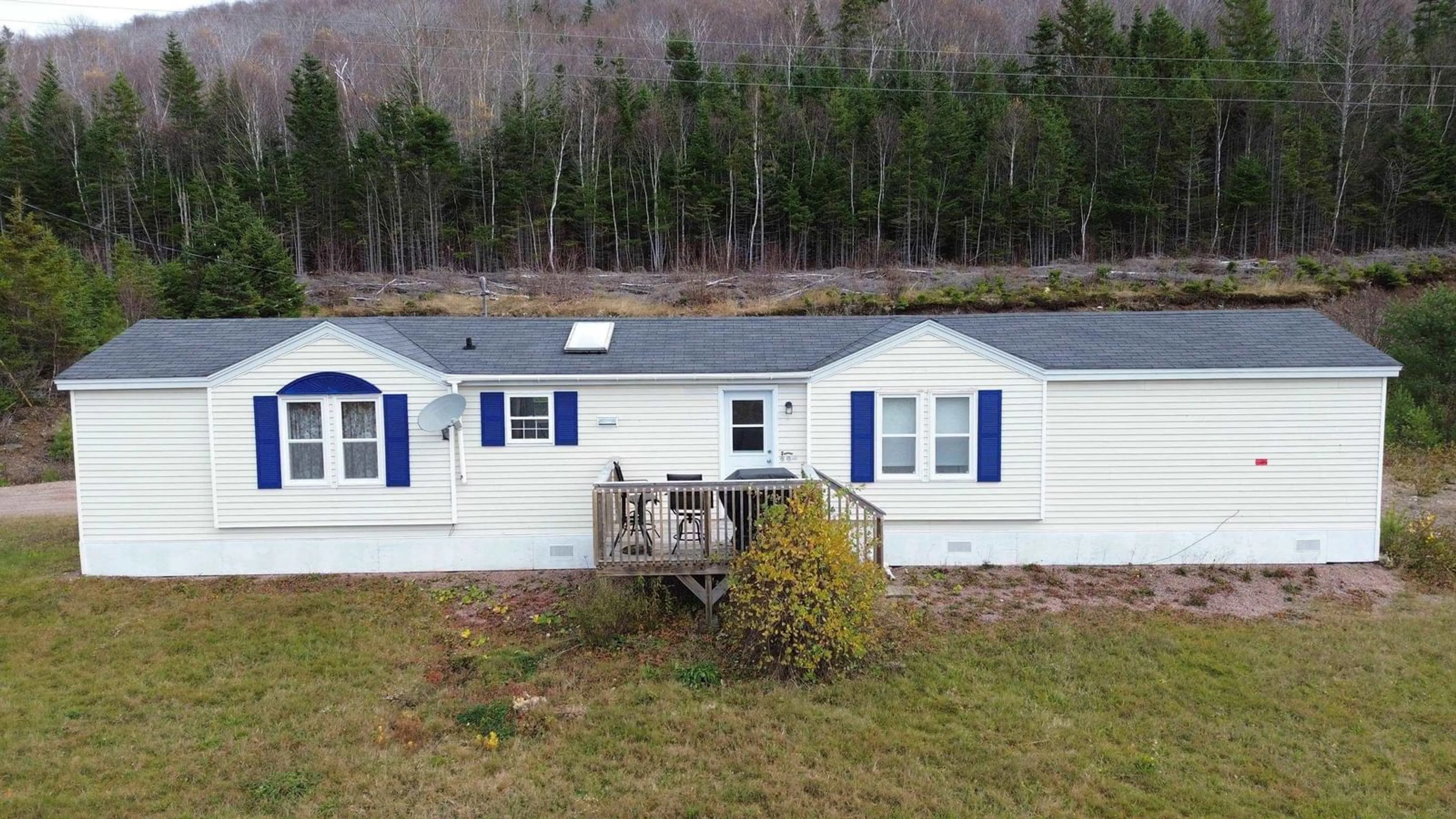 A pic from outside/outdoor area/front of a property/back of a property/a pic from drone, water/lake/river/ocean view for 1424 Highway 395, South Lake Ainslie Nova Scotia B0E 3M0
