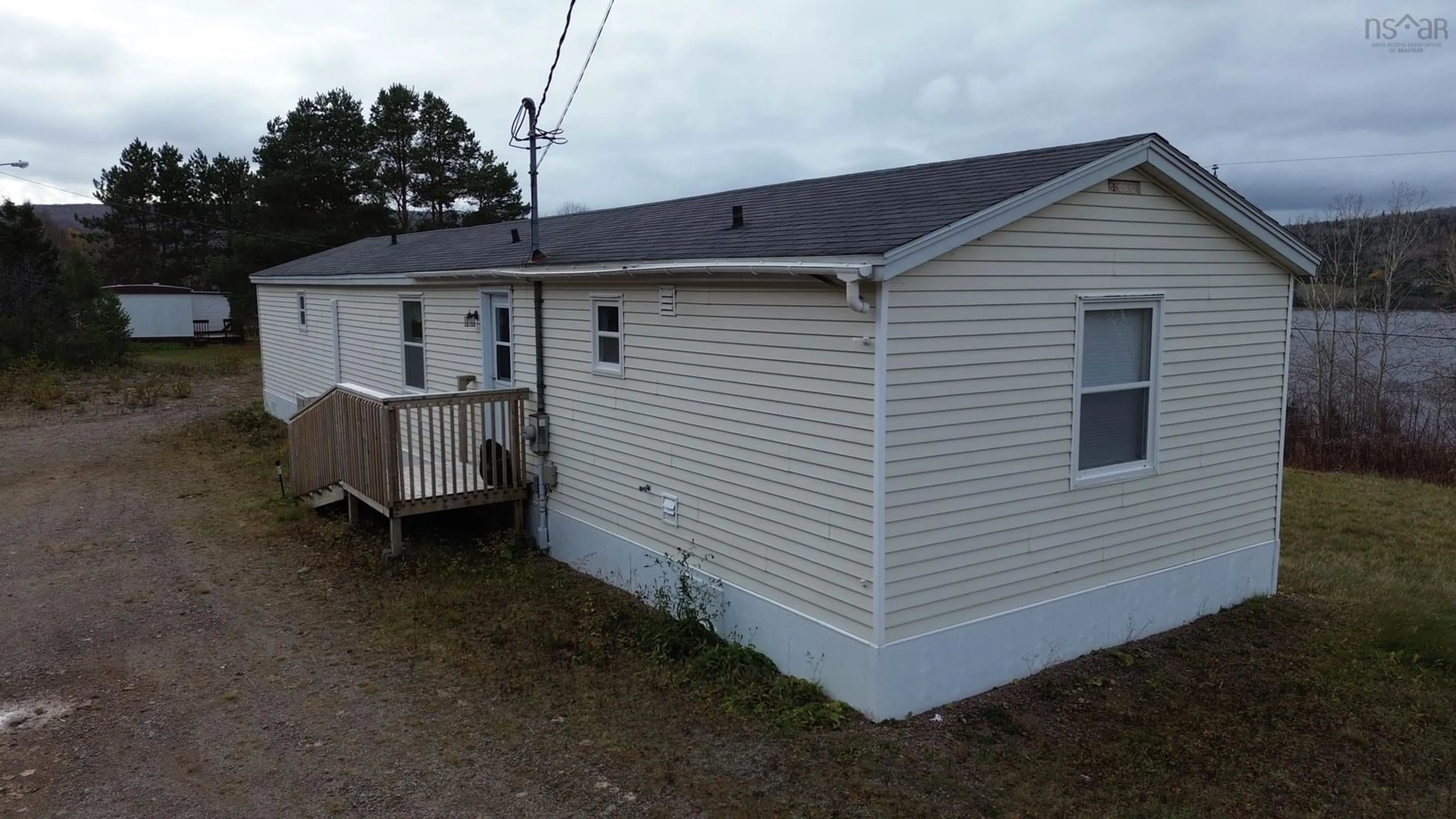 Home with vinyl exterior material, building for 1424 Highway 395, South Lake Ainslie Nova Scotia B0E 3M0
