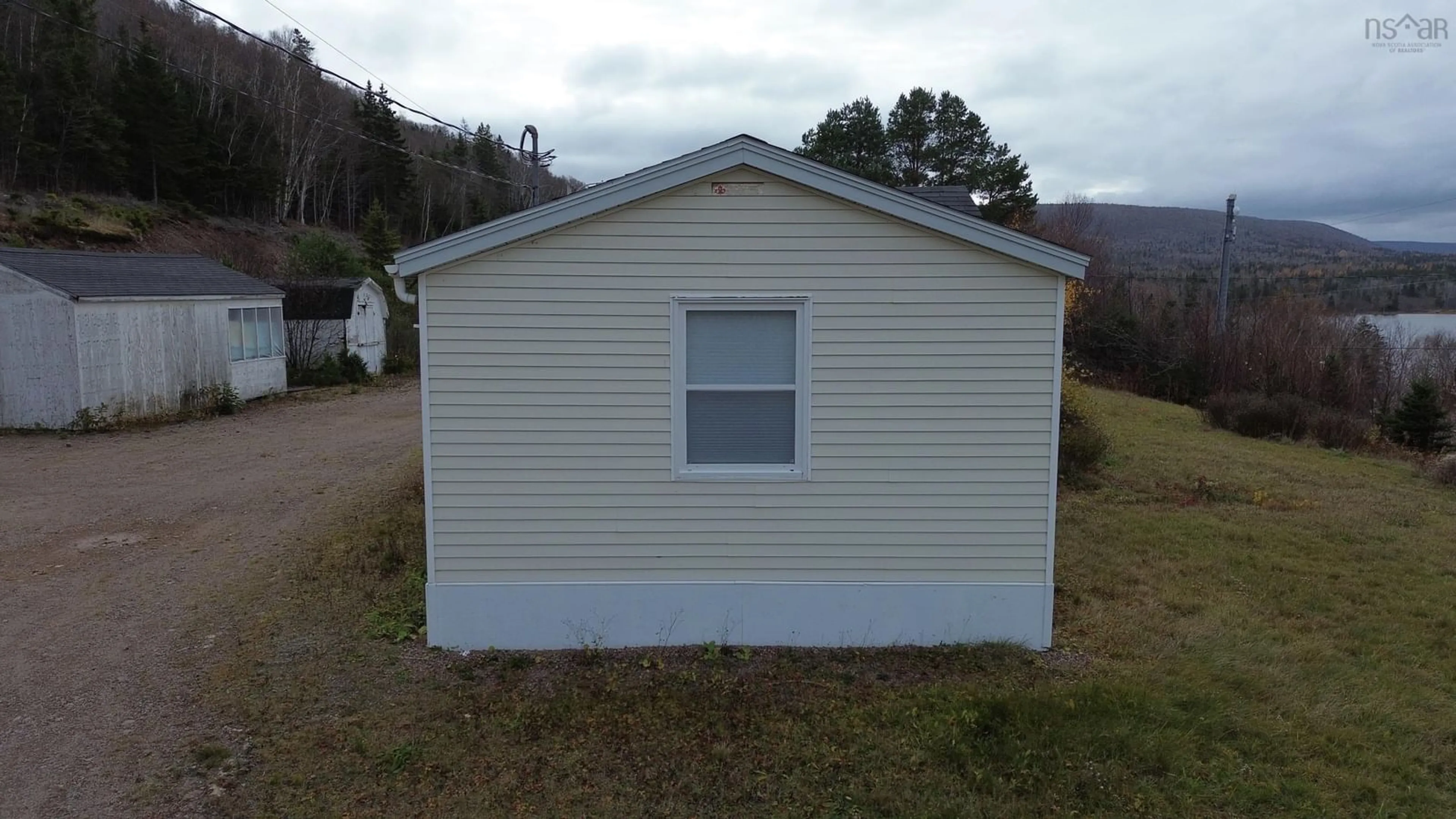 Home with vinyl exterior material, unknown for 1424 Highway 395, South Lake Ainslie Nova Scotia B0E 3M0