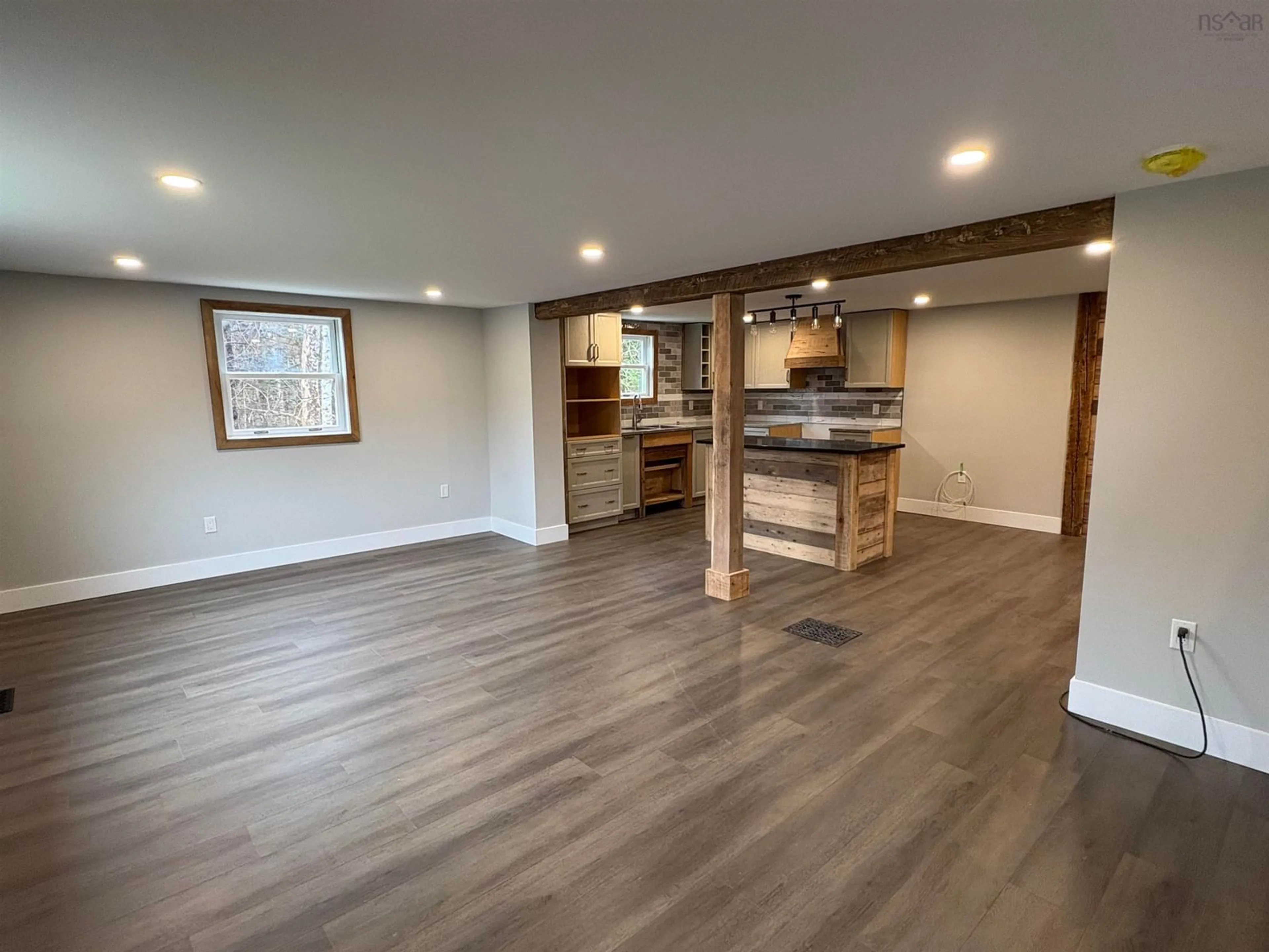 Open concept kitchen, wood/laminate floor for 1291 Mcnally Rd, Morden Nova Scotia B0P 1A0
