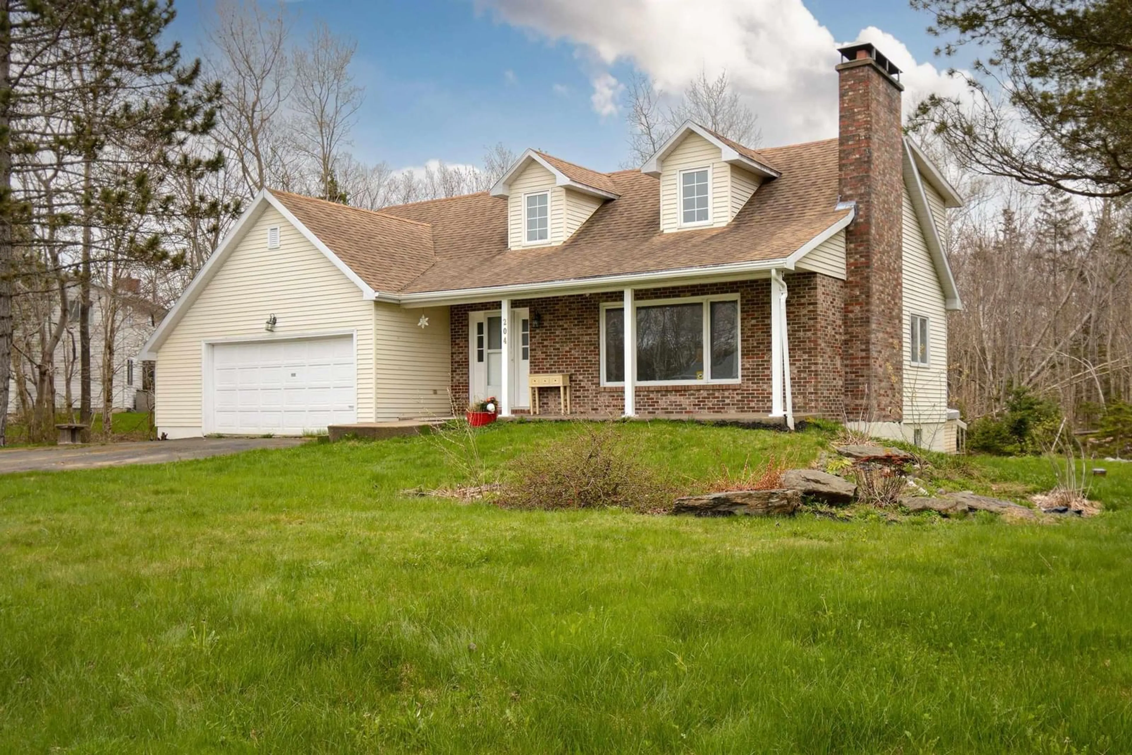 Home with vinyl exterior material, street for 204 Fatima Dr, Sydney River Nova Scotia B1S 1L1