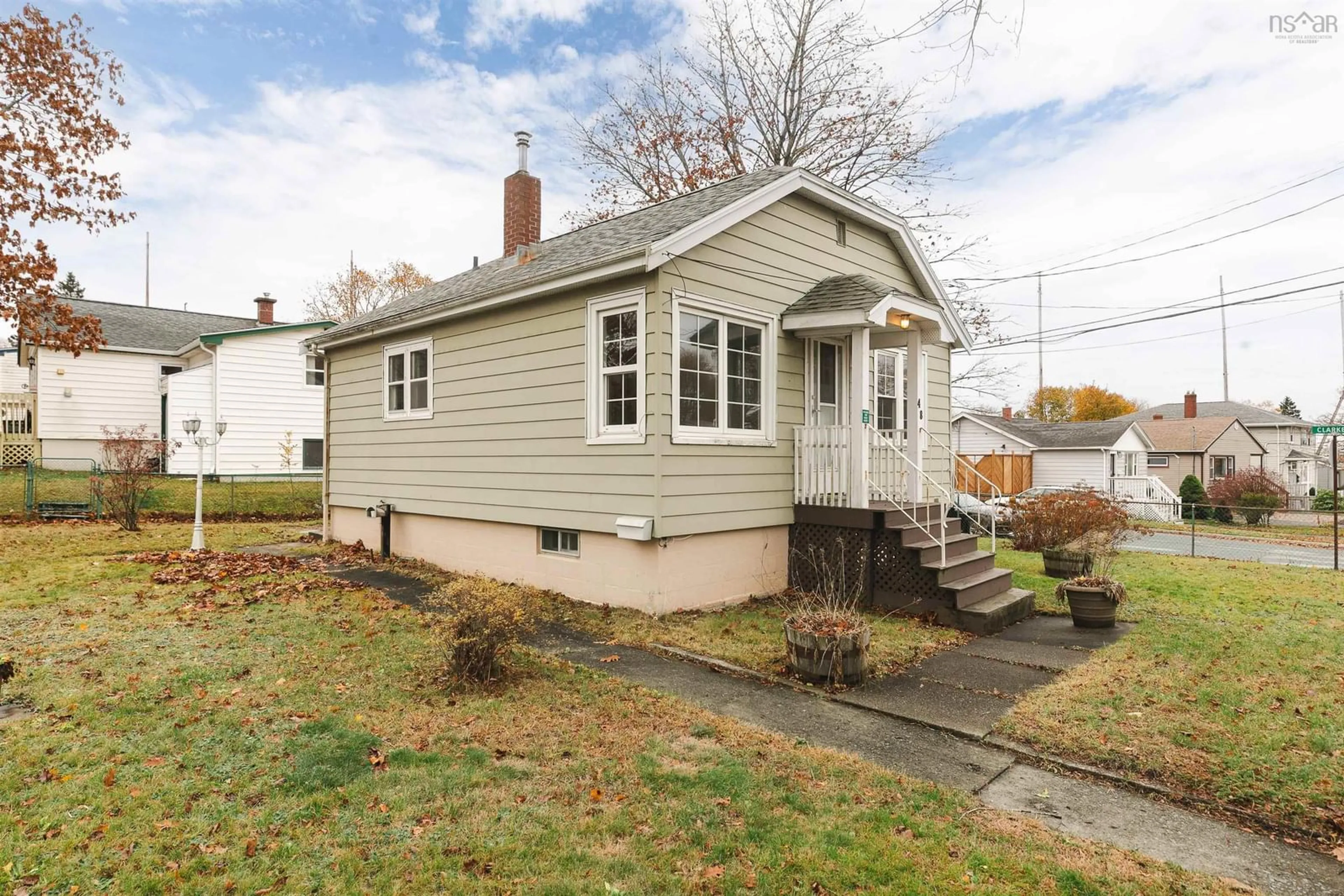 Home with vinyl exterior material, street for 48 Woodland Ave, Dartmouth Nova Scotia B3A 3J8
