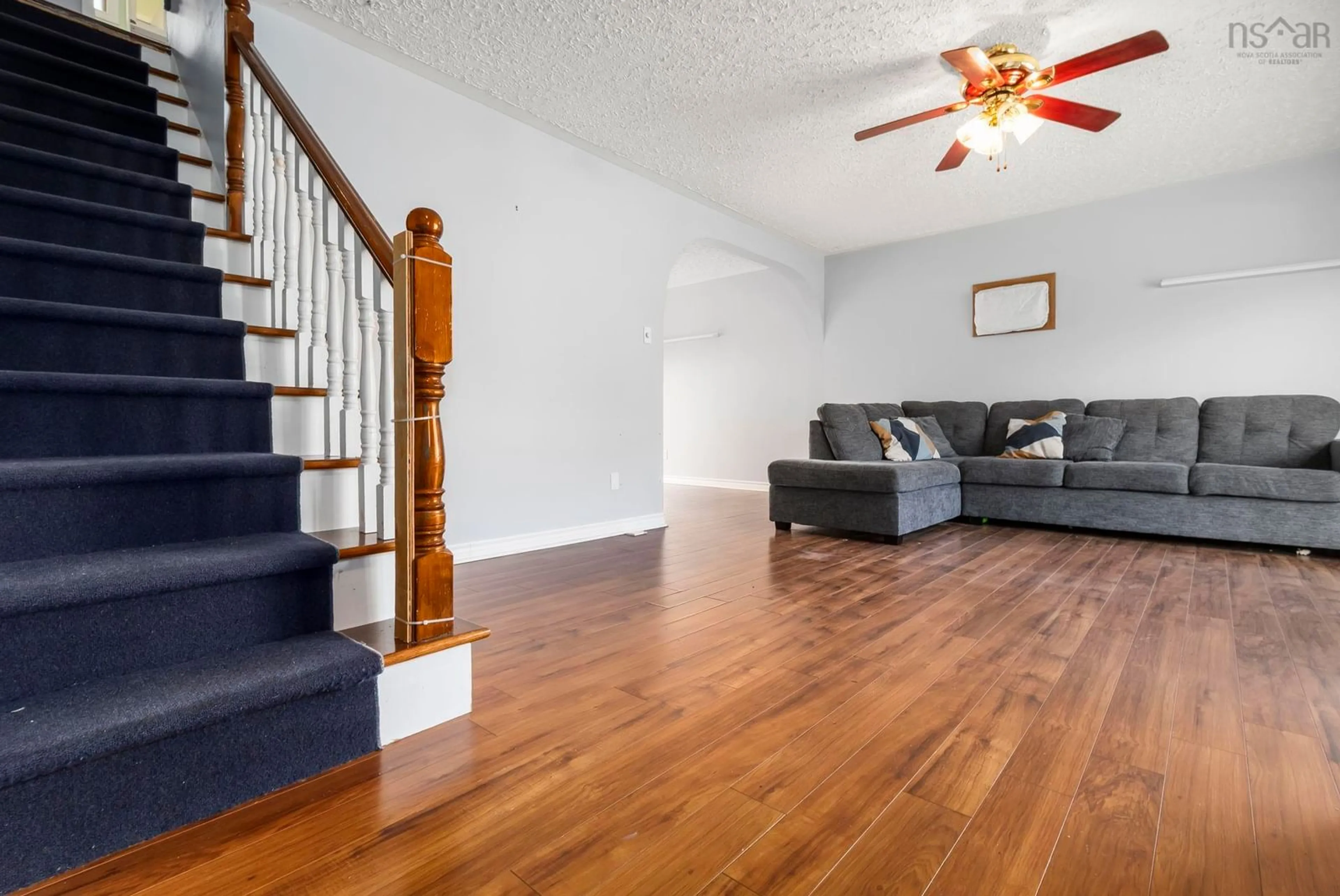 Living room with furniture, wood/laminate floor for 23 Nordic Cres, Lower Sackville Nova Scotia B4C 2E4