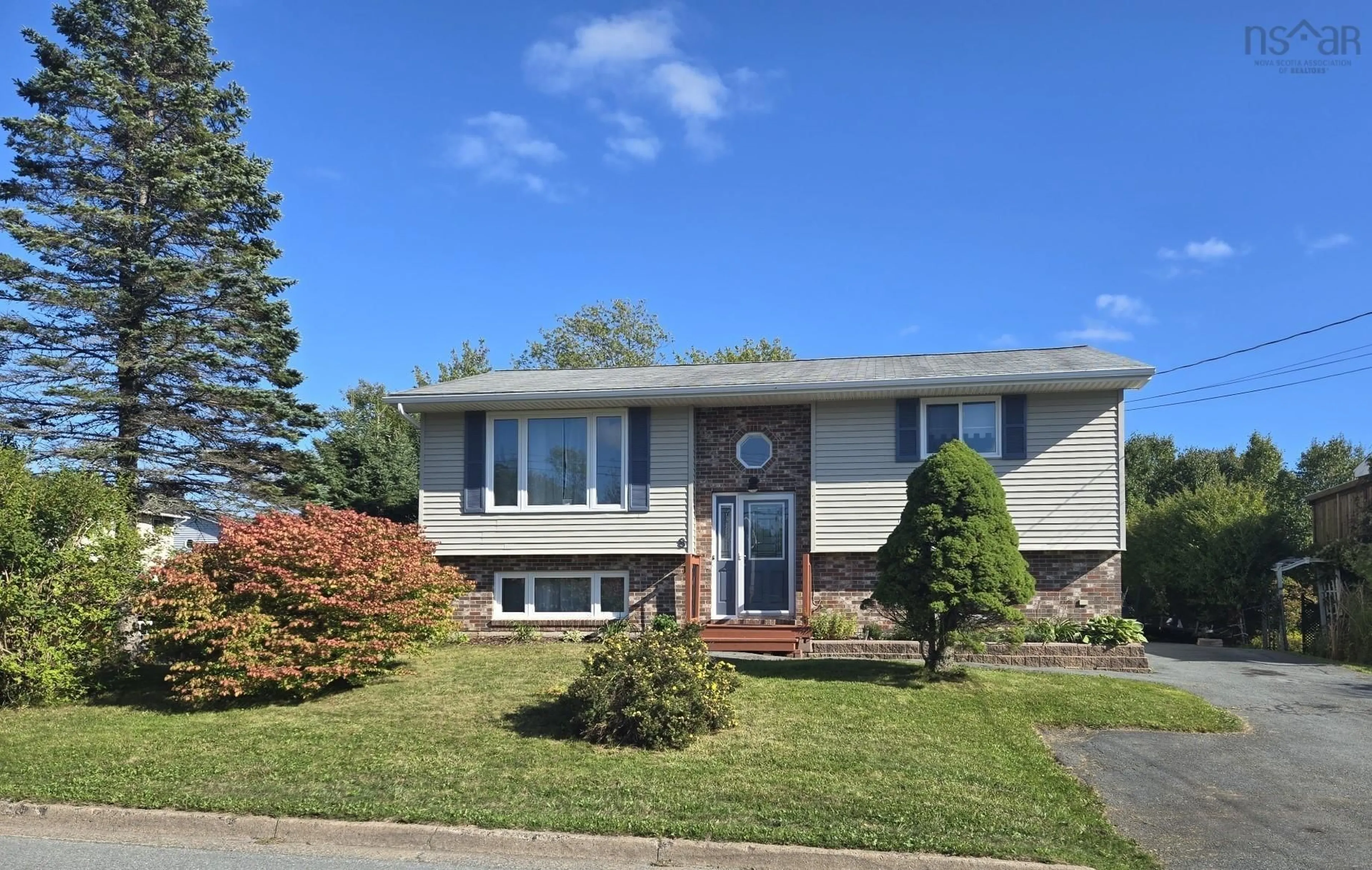 Home with vinyl exterior material, street for 8 Sherwood St, Colby Nova Scotia B2W 6E7