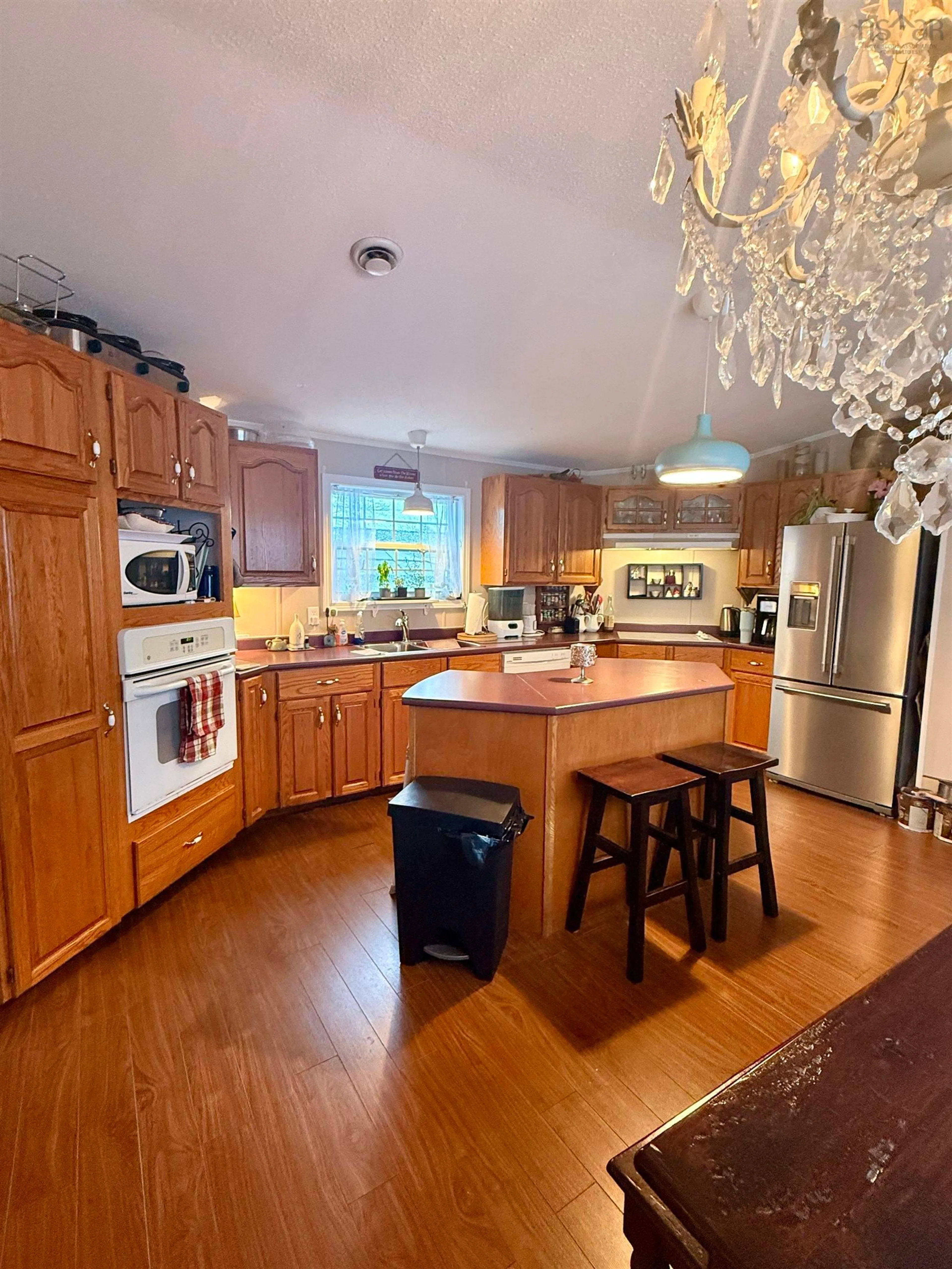 Open concept kitchen, unknown for 24 Third St, Hammonds Plains Nova Scotia B4B 1P9