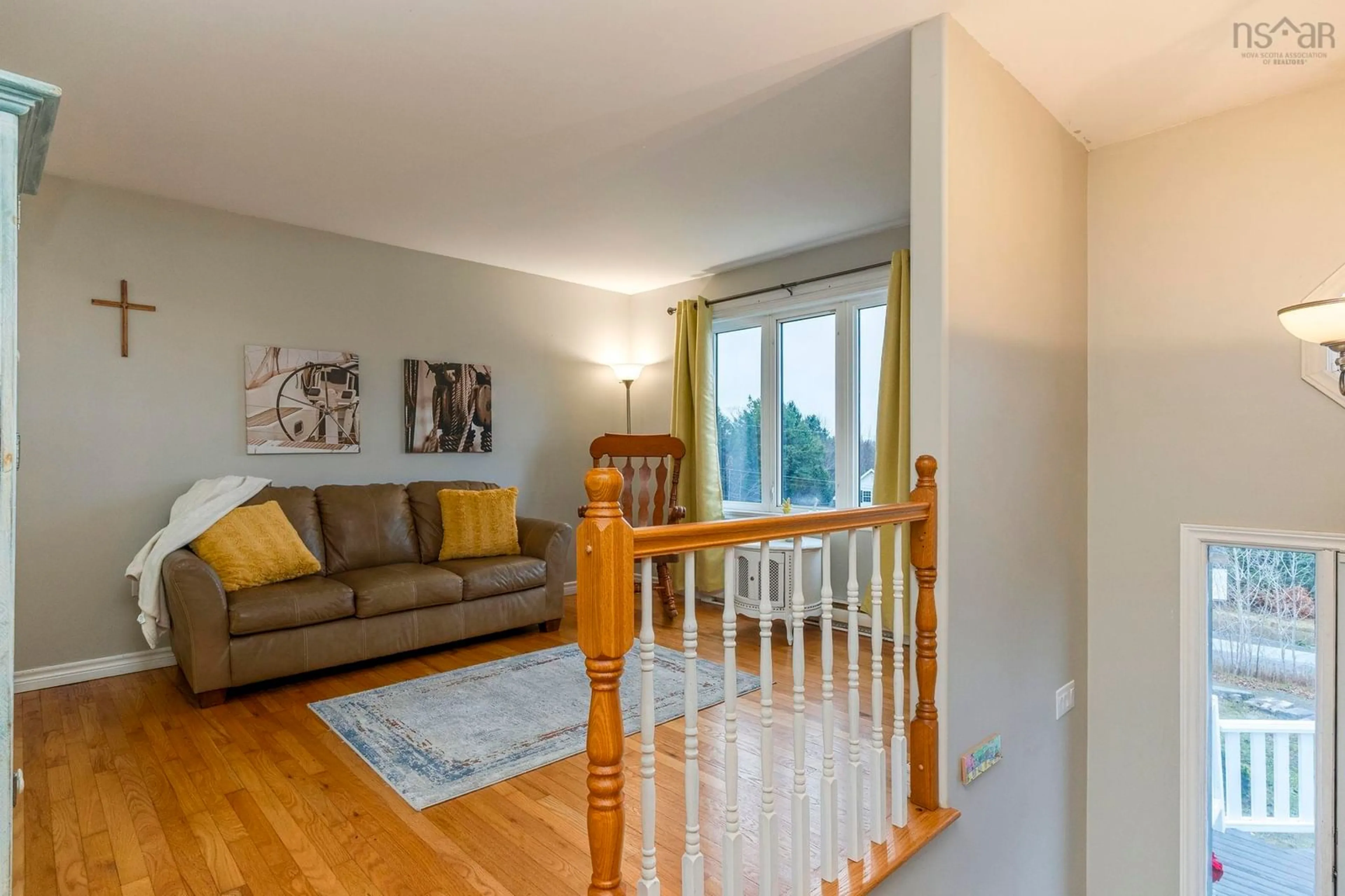 Living room with furniture, wood/laminate floor for 81 Lylewood Dr, Middle Sackville Nova Scotia B4E 3B1