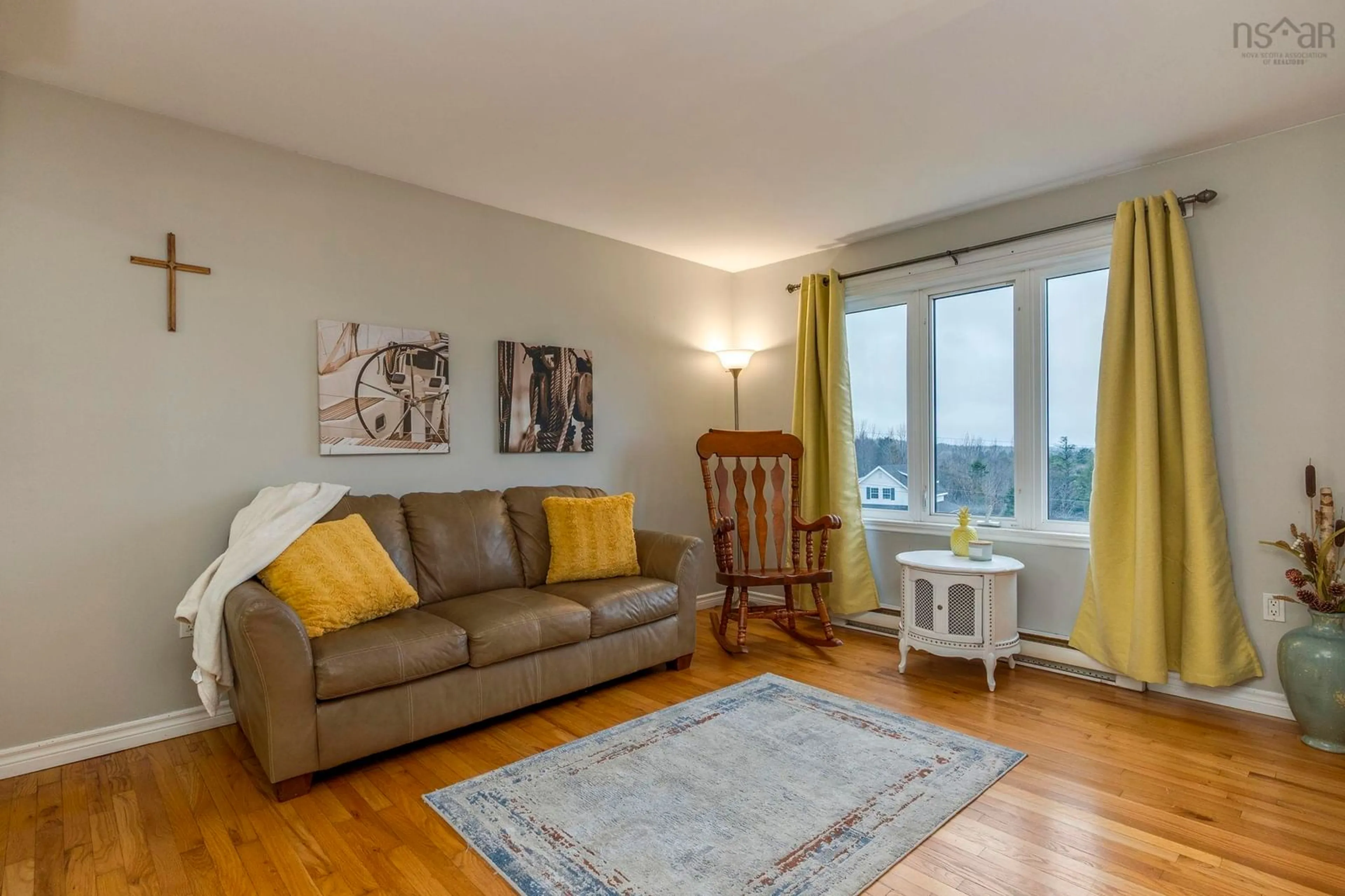 Living room with furniture, wood/laminate floor for 81 Lylewood Dr, Middle Sackville Nova Scotia B4E 3B1